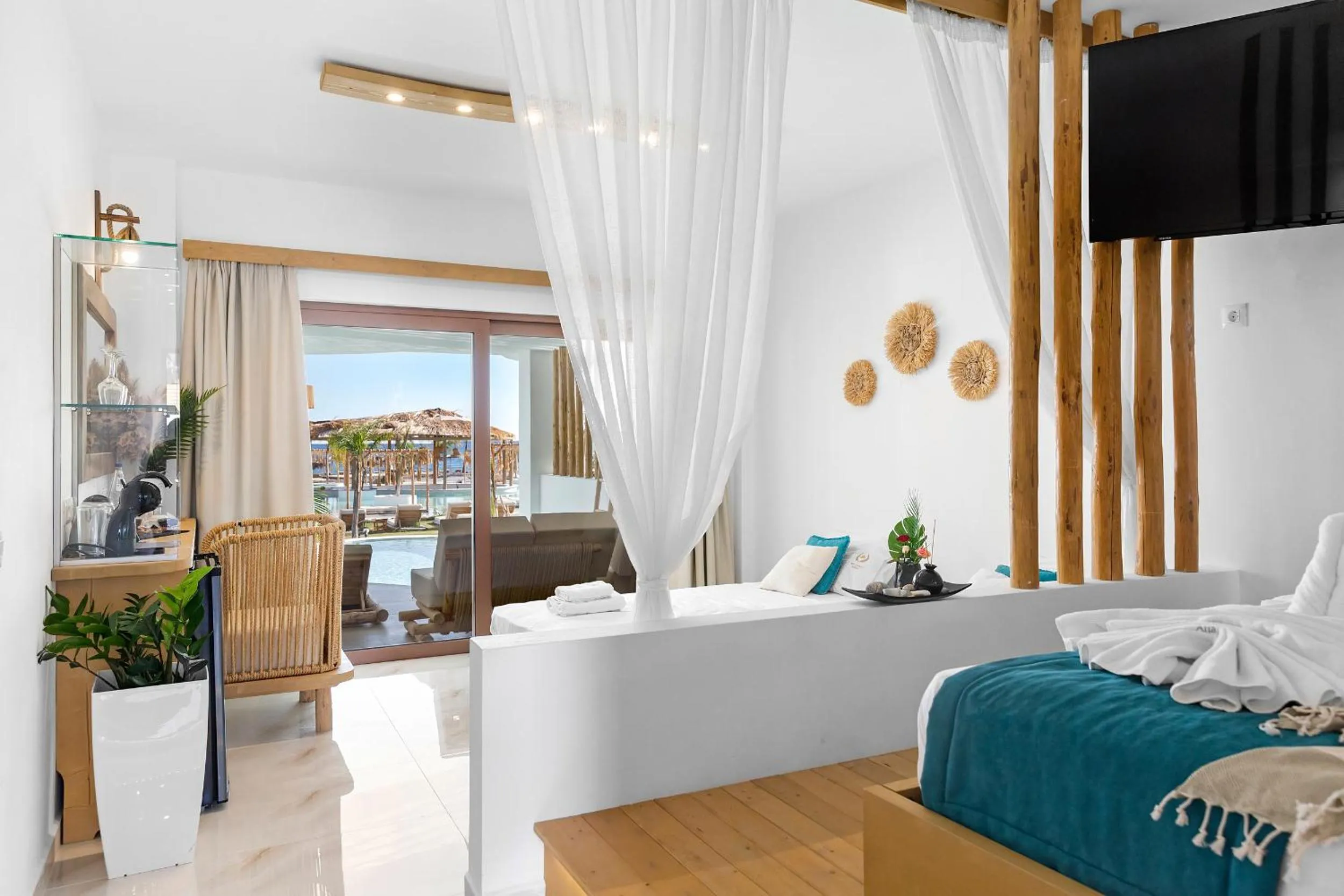 Bed in Alia Beachfront Suites and Spa