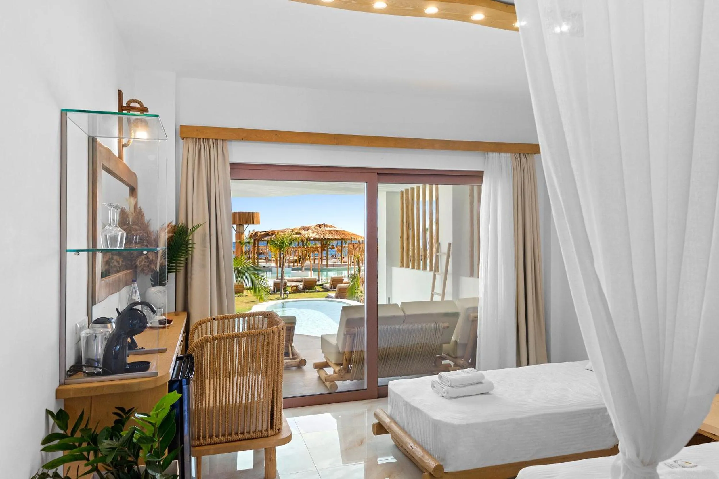 Bed in Alia Beachfront Suites and Spa