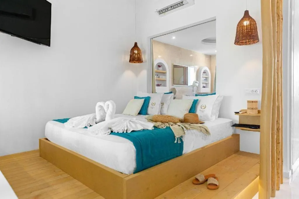 Bed in Alia Beachfront Suites and Spa