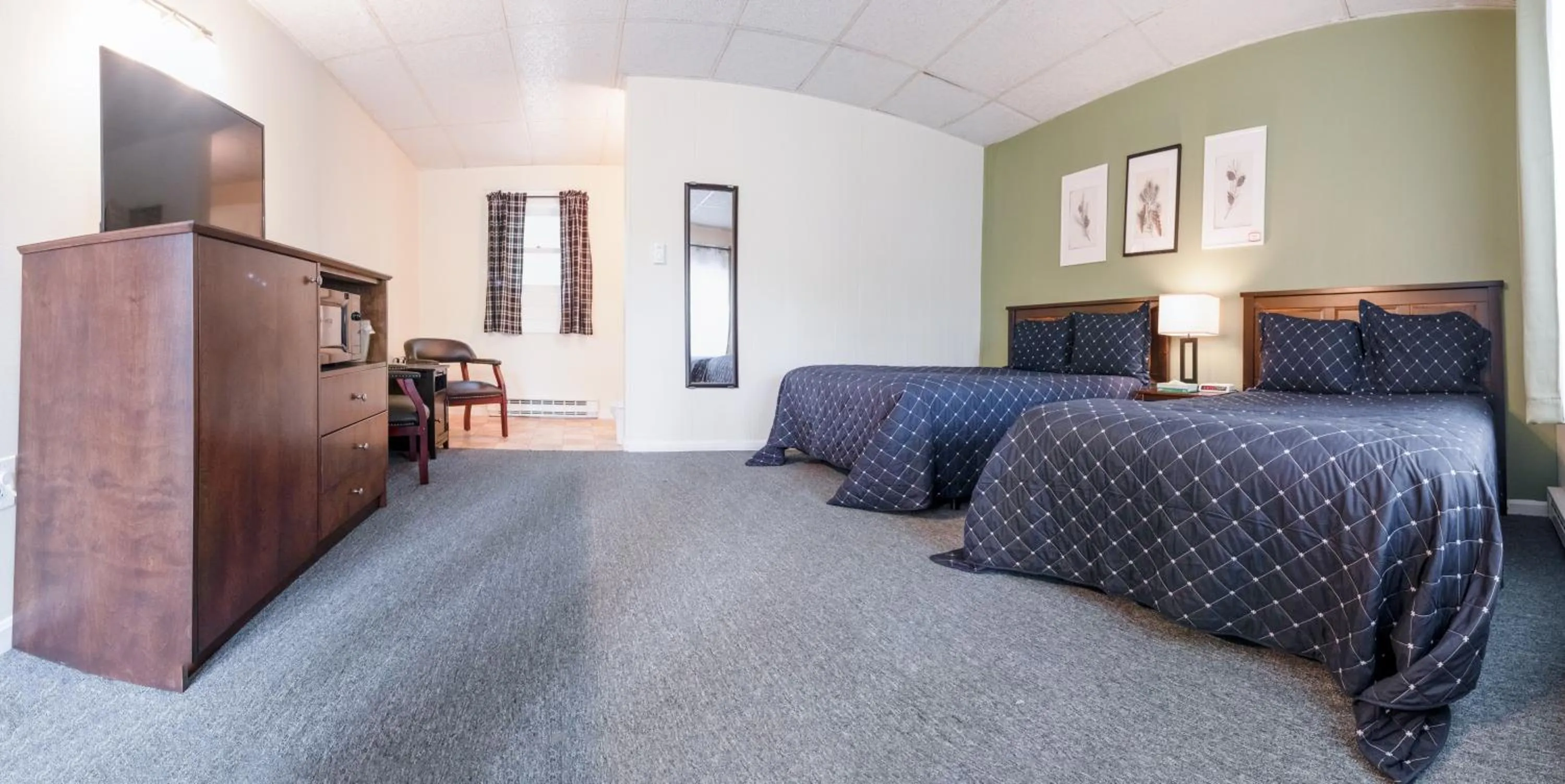 Bed in Acadia Pines Motel