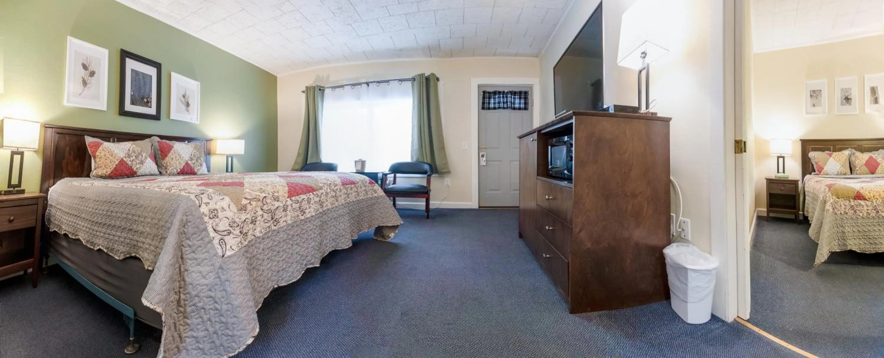 Bed in Acadia Pines Motel