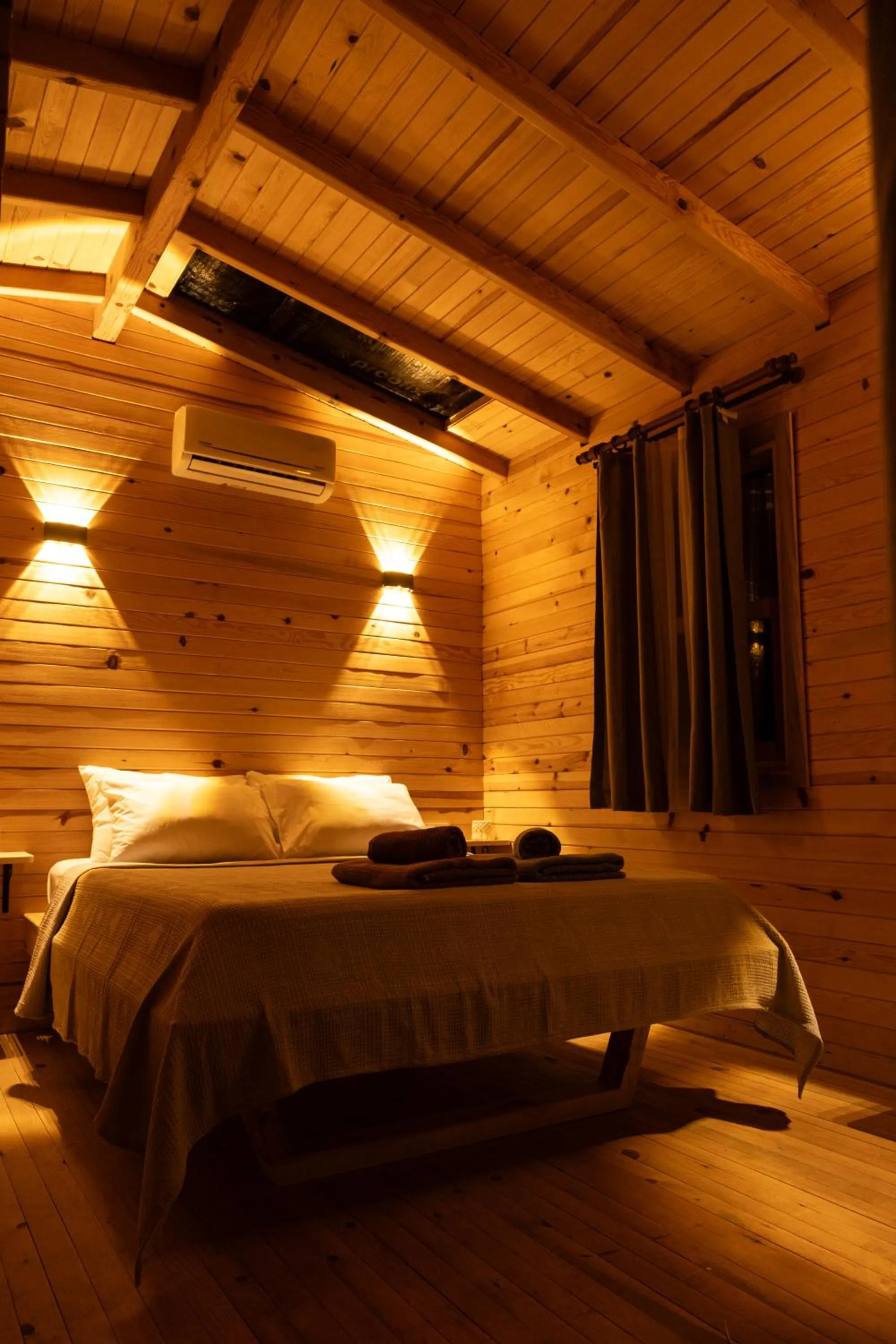 Bed in Goat Bungalow and Camping