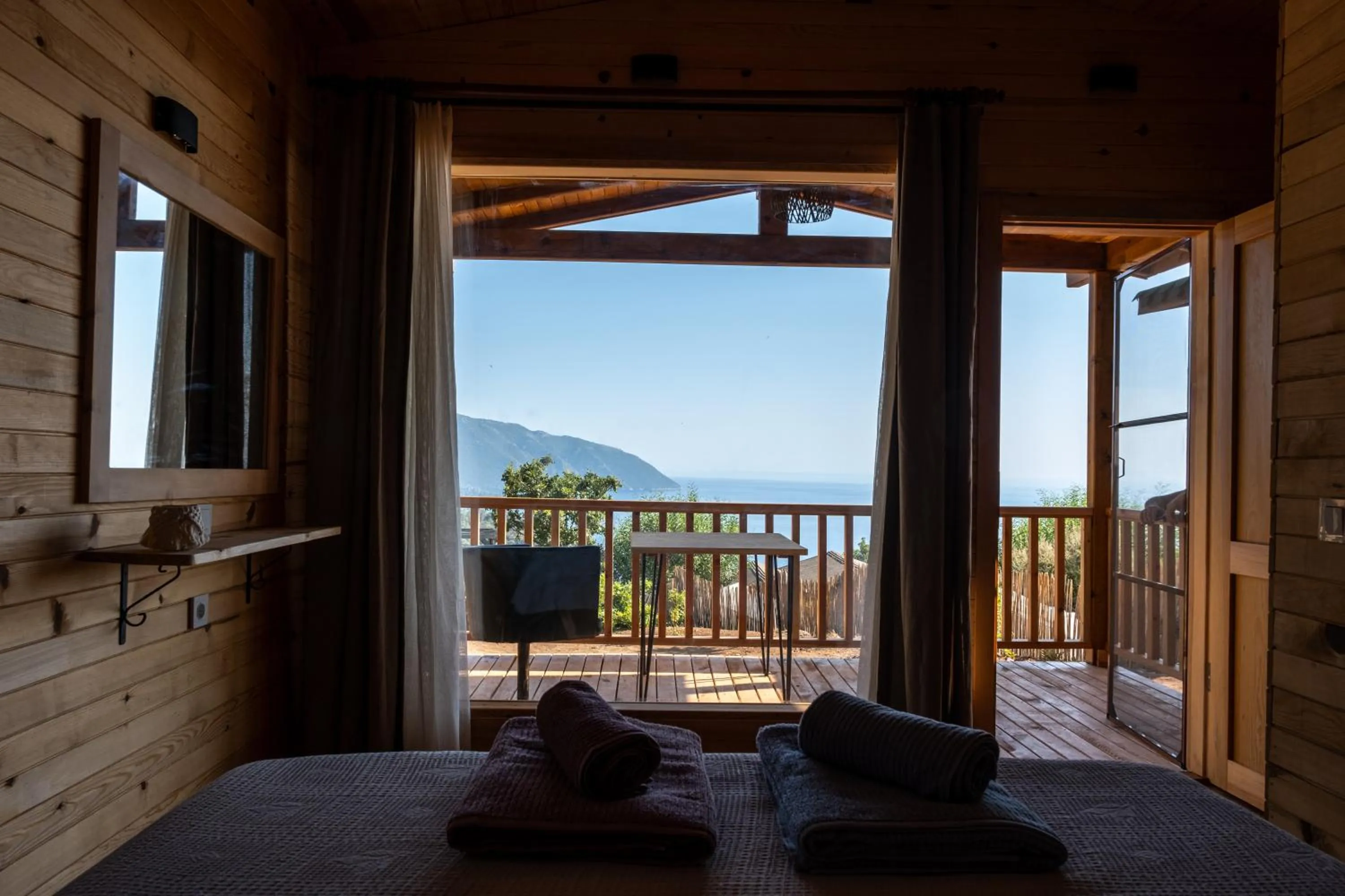 Bed in Goat Bungalow and Camping