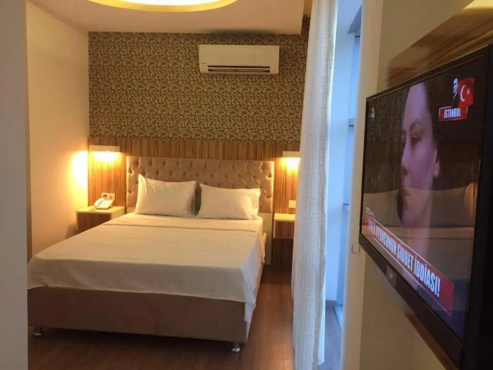 Bed in Grand Mardin Hotel