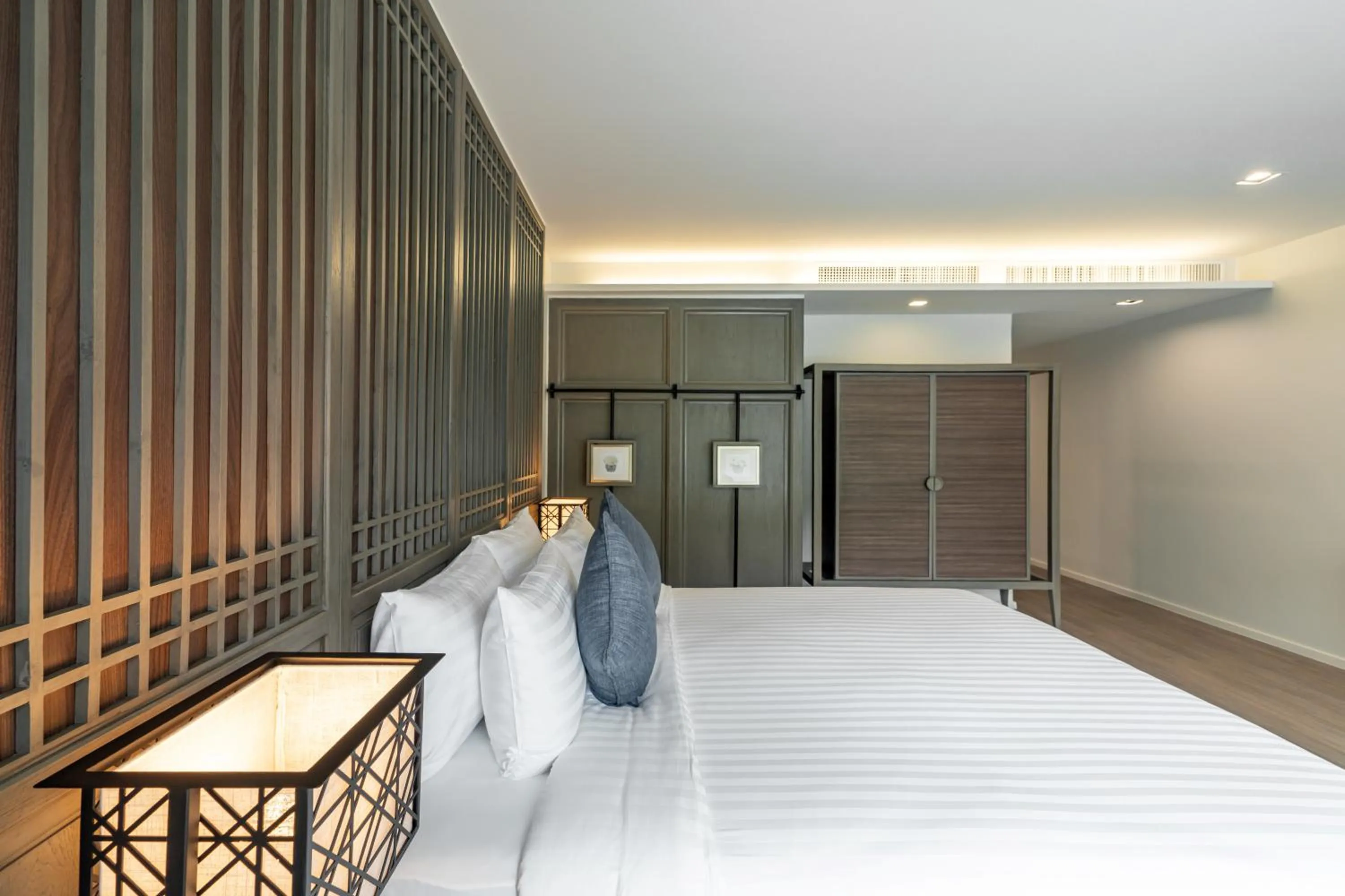 Bed in Bella Nara Phuket Naiyang Beach