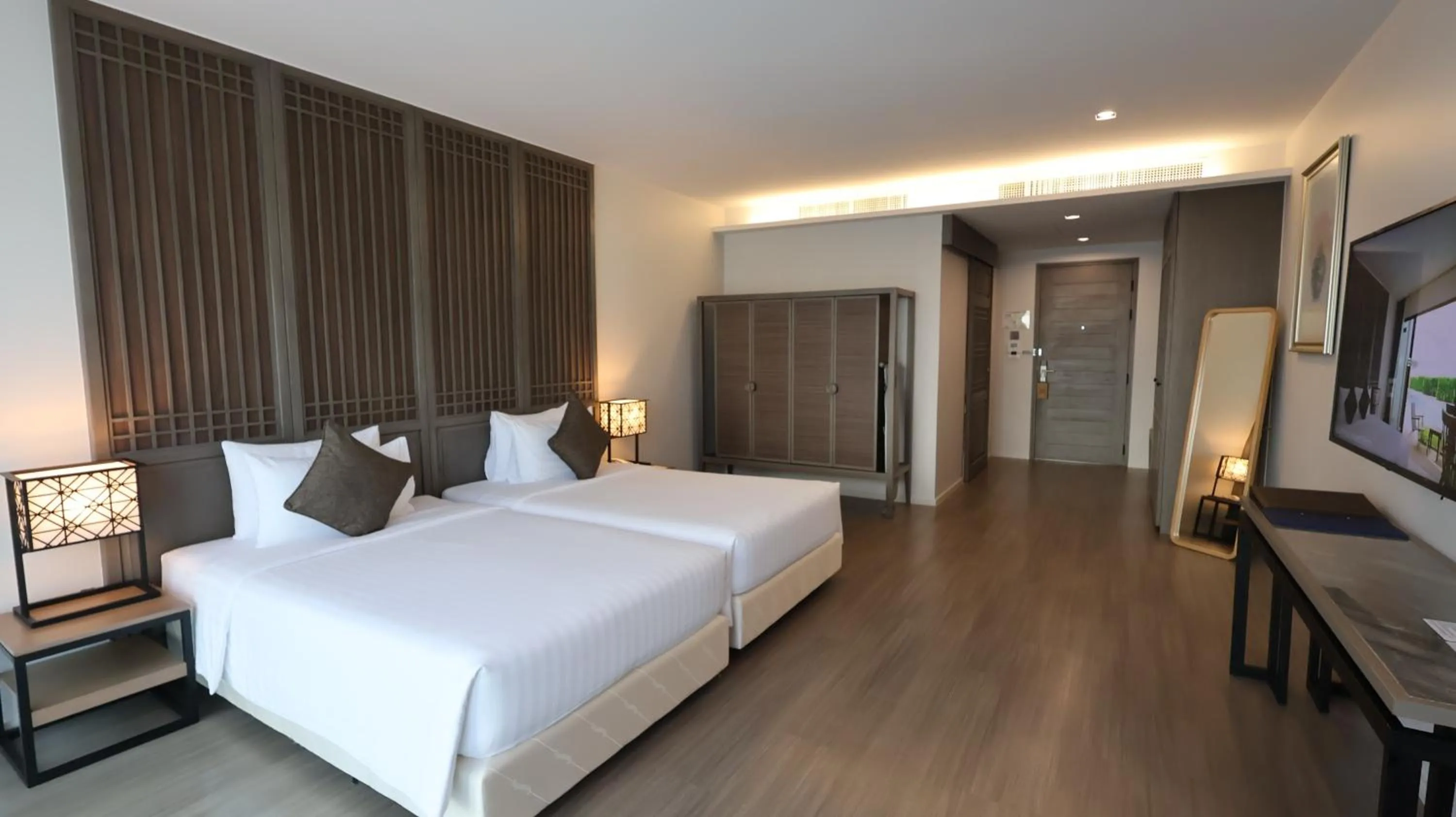 Bed in Bella Nara Phuket Naiyang Beach