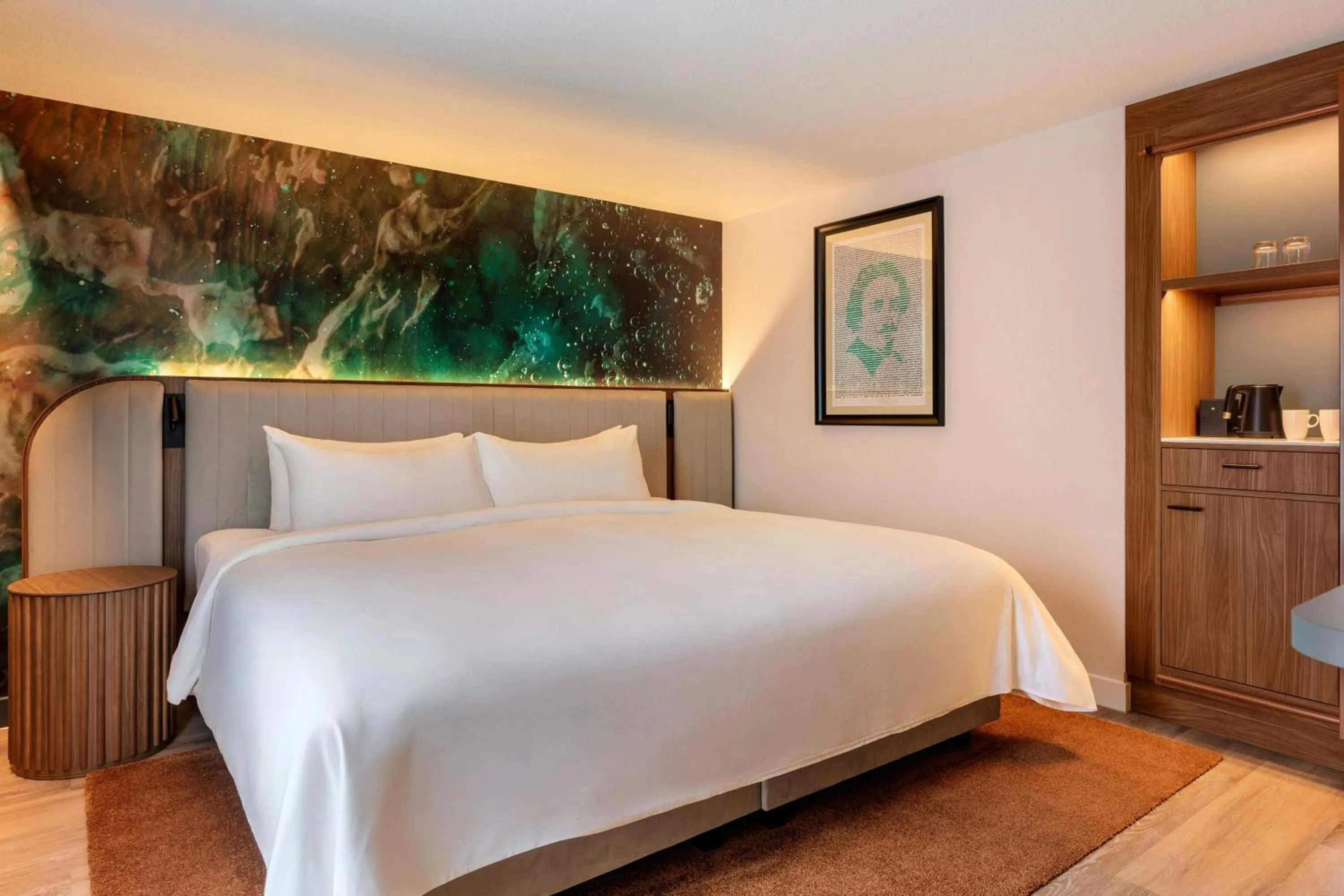 Living room, Bed in Renaissance Amsterdam Hotel