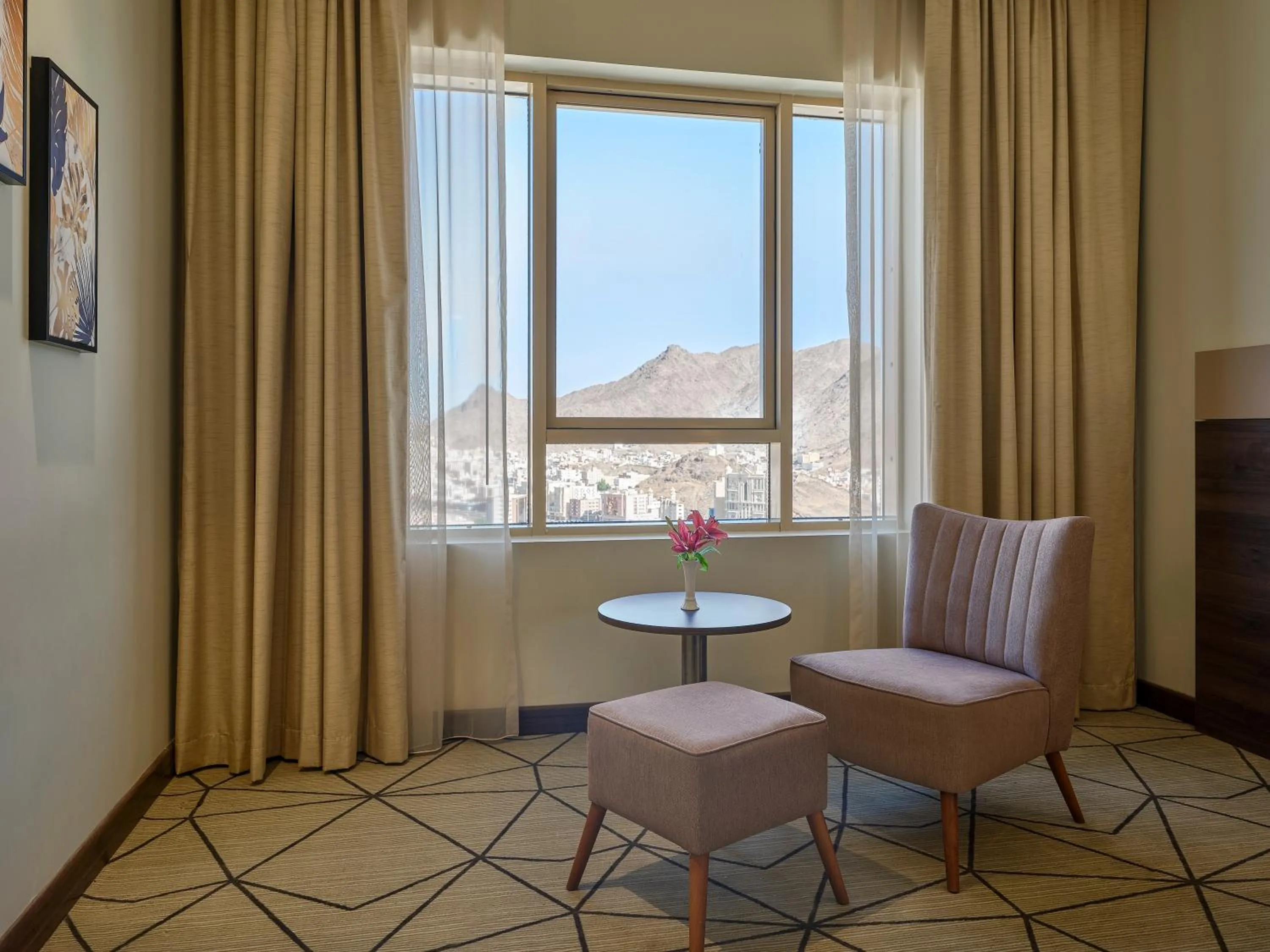 Seating area in Wirgan Al Noor, Tapestry Collection by Hilton