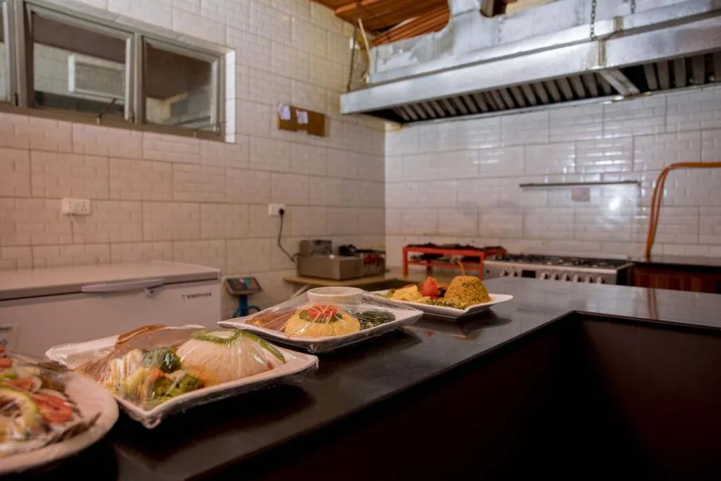 Kitchen or kitchenette in Velvet Suites