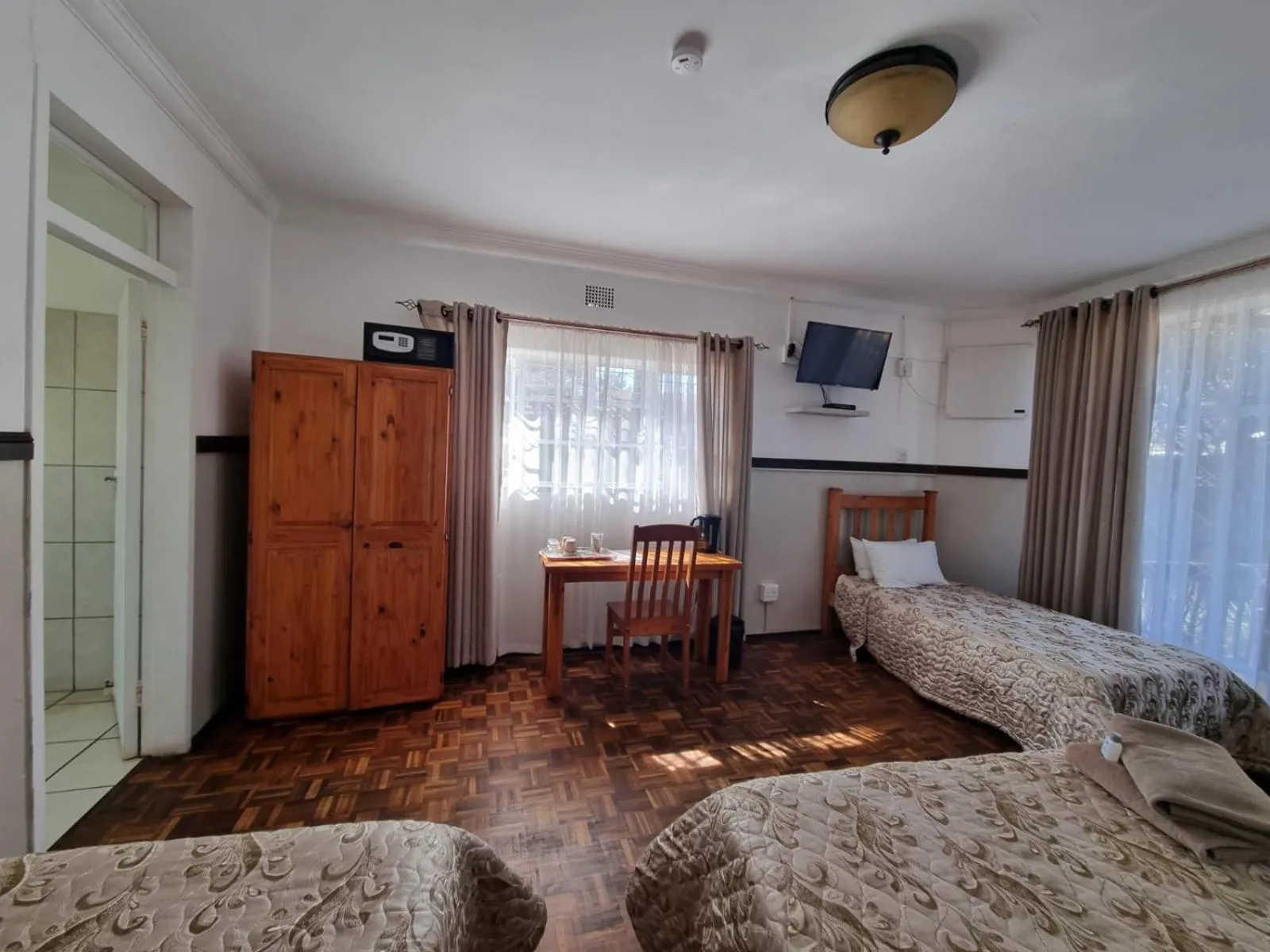 Photo of the whole room, Bed in Emerald Guesthouse