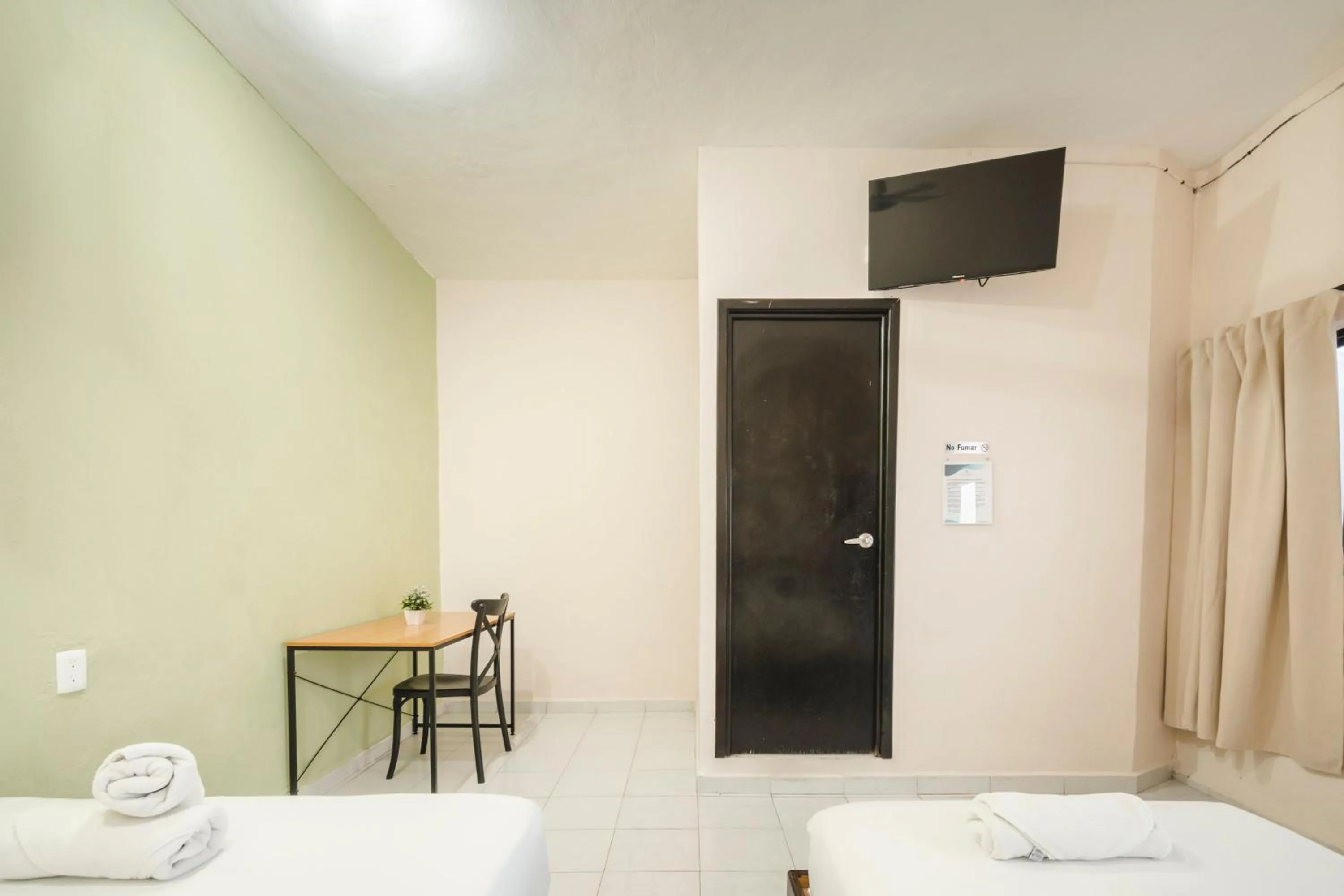 Photo of the whole room in Hotel Quiam