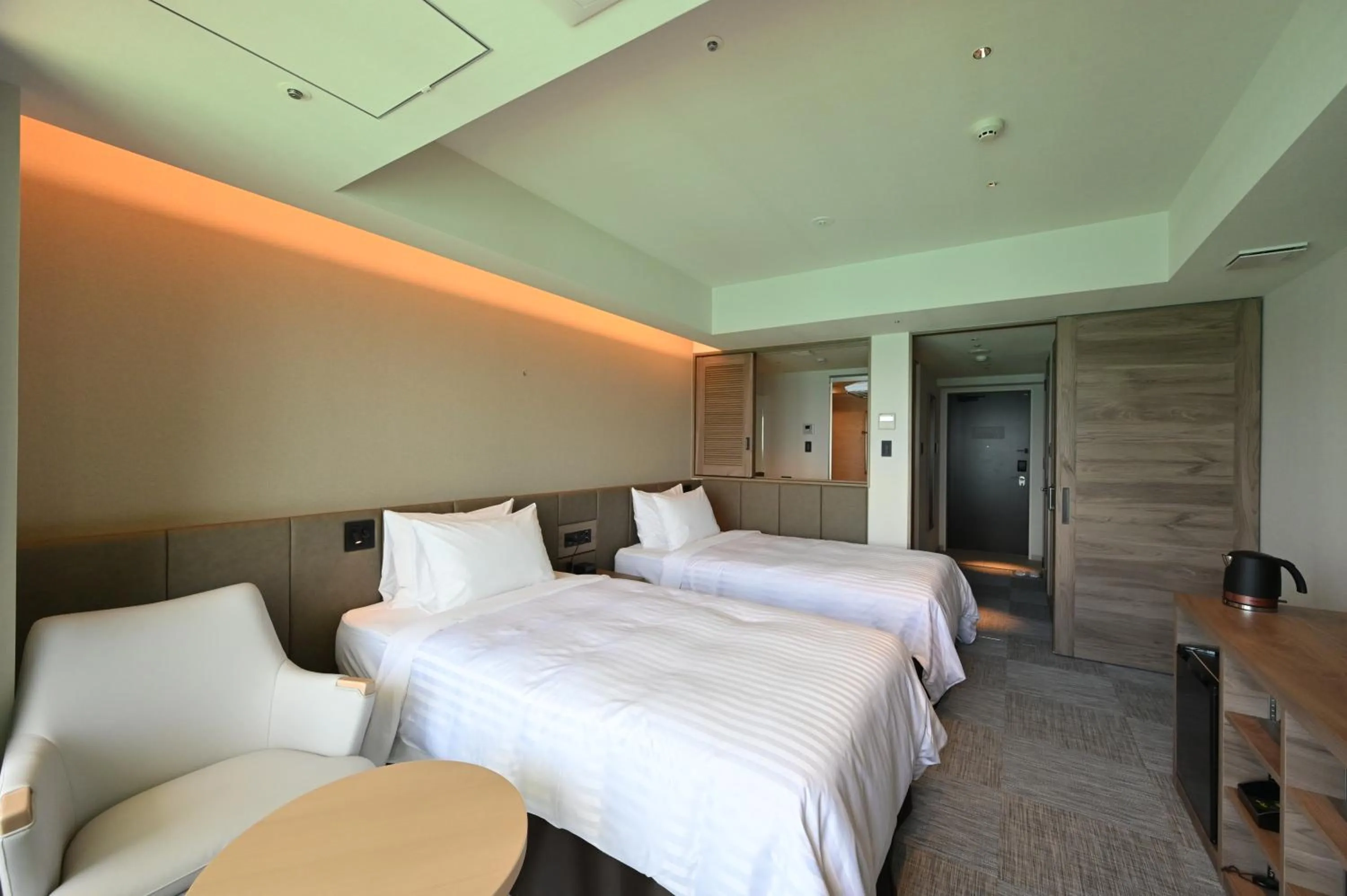 Photo of the whole room, Bed in Best Western Okinawa Kouki Beach