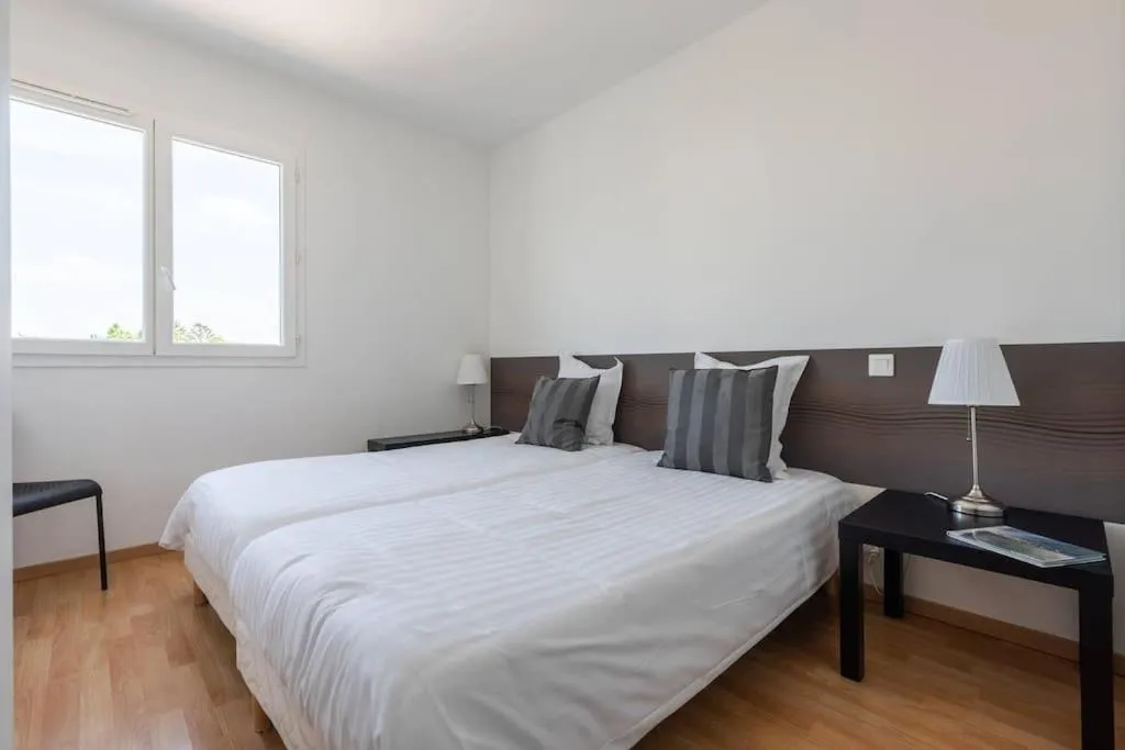 Bed in La Résidence Les Grands Vignobles