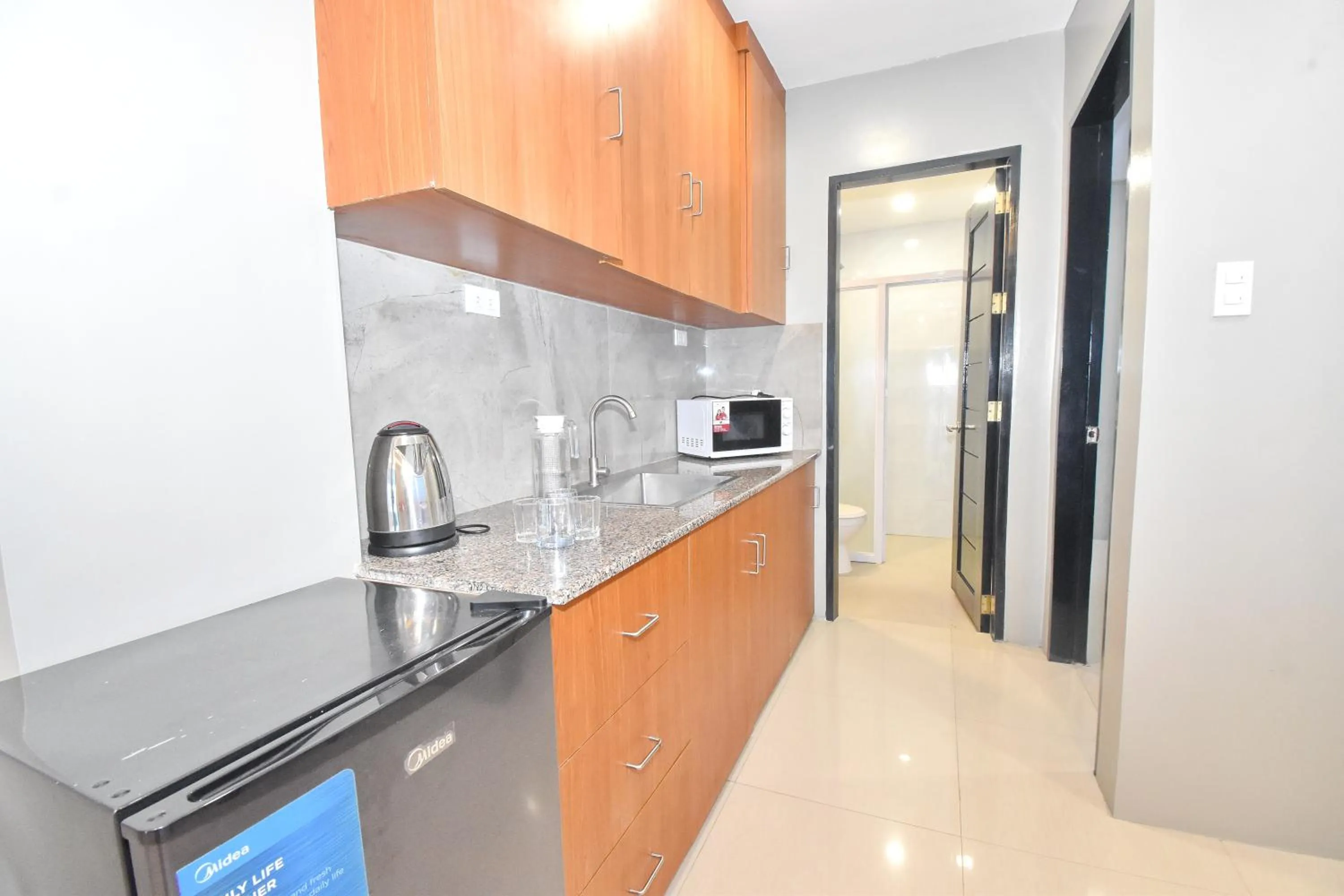 Kitchen or kitchenette in Blue Suites Boracay