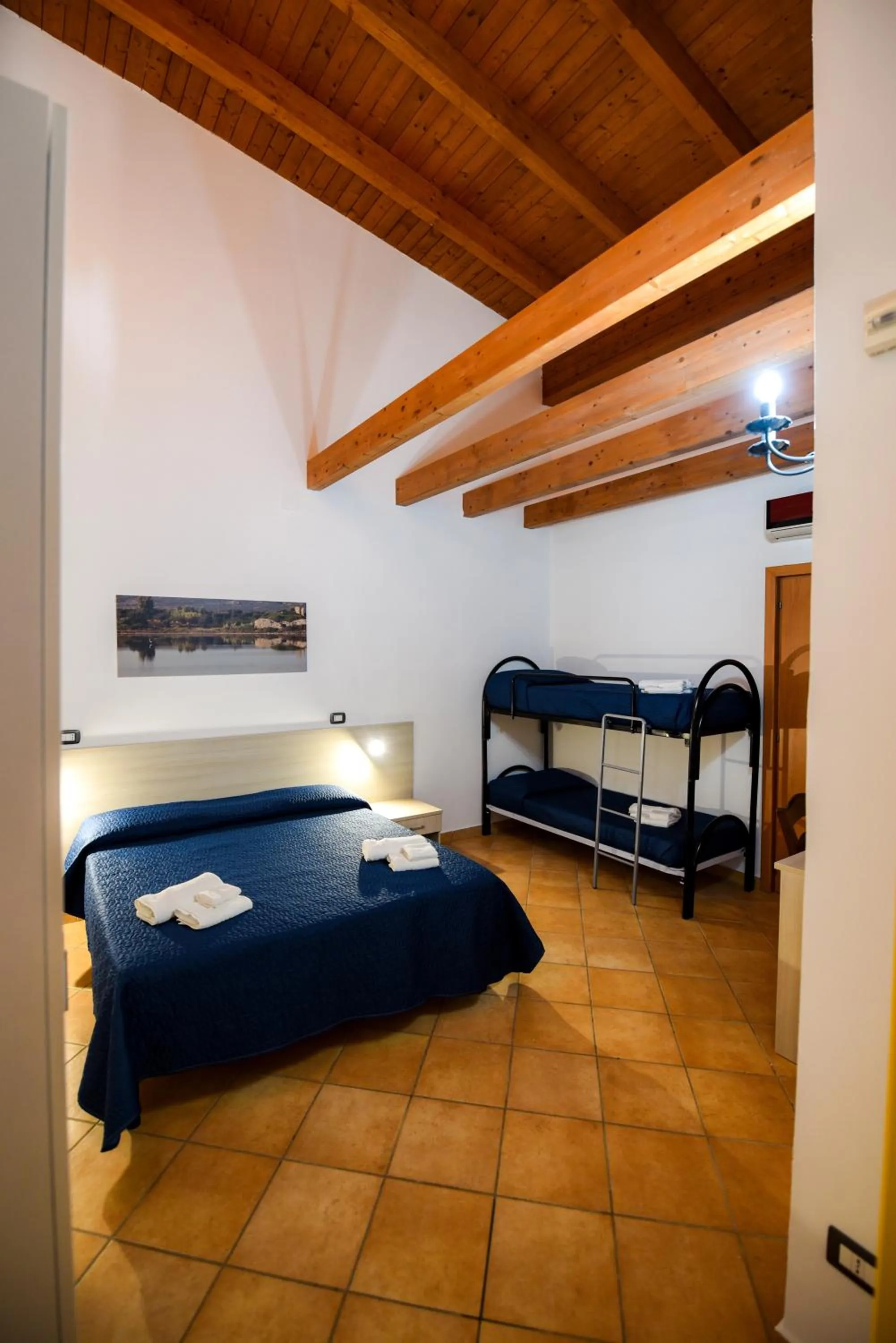 Bed in Giardini Sausari Residence