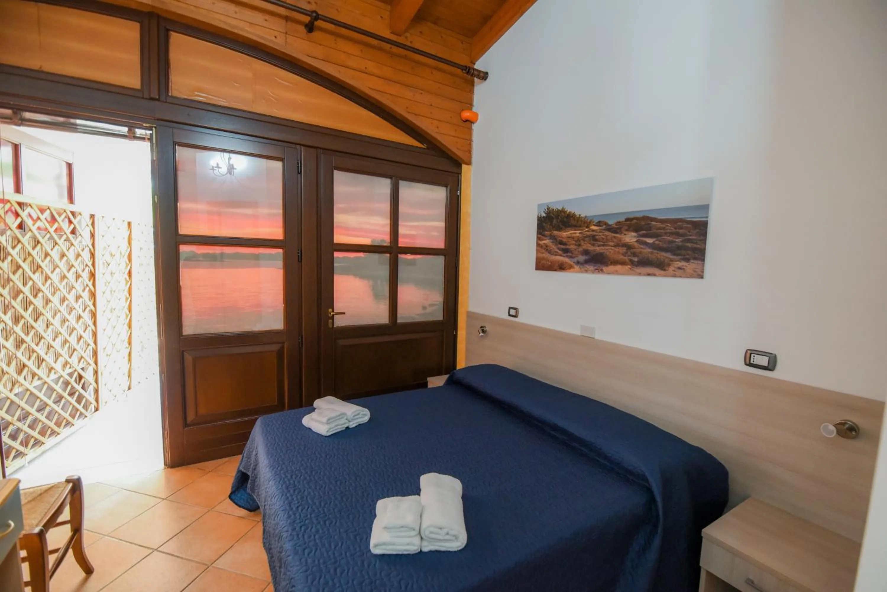 Bed in Giardini Sausari Residence