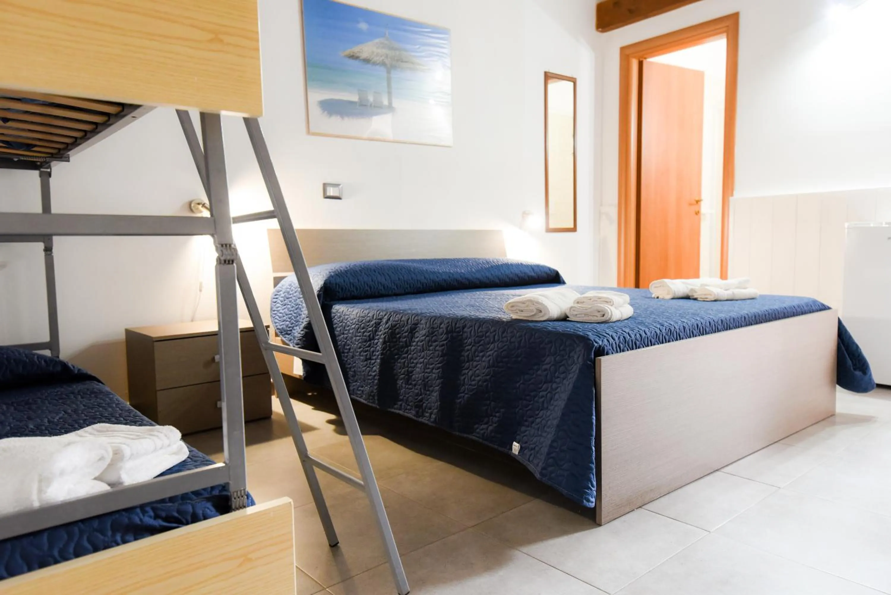 Bed in Giardini Sausari Residence