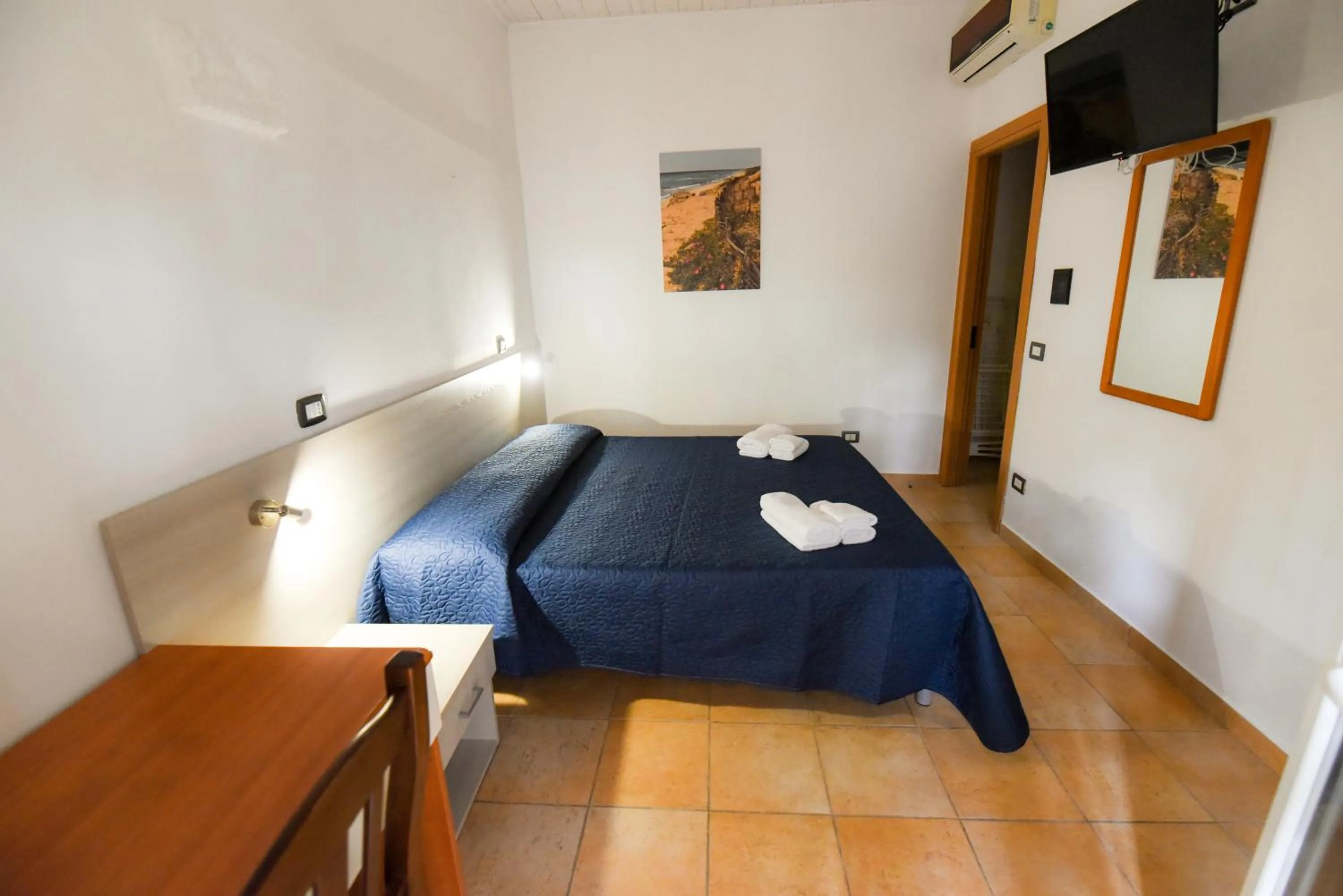 Bed in Giardini Sausari Residence