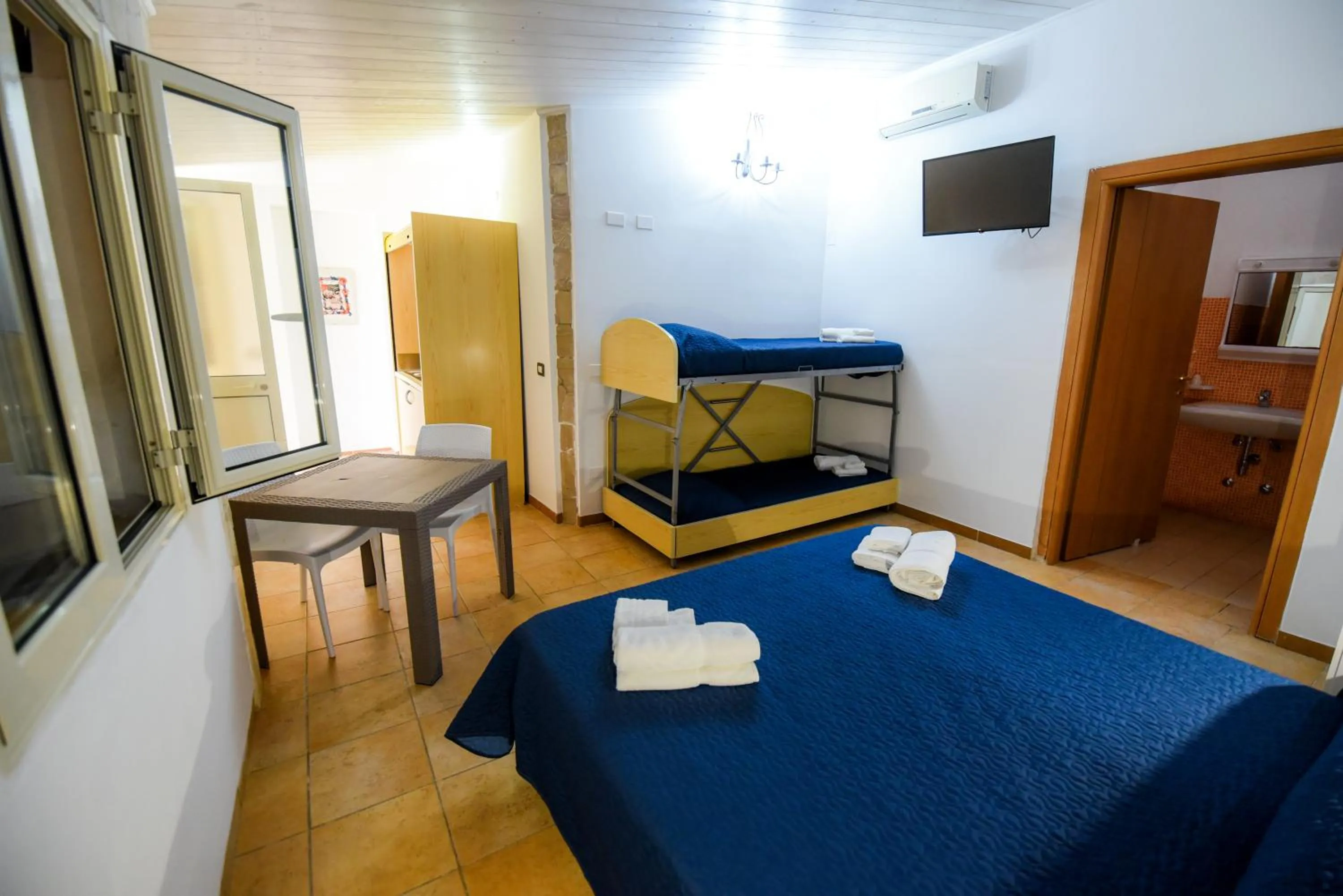 Bed in Giardini Sausari Residence