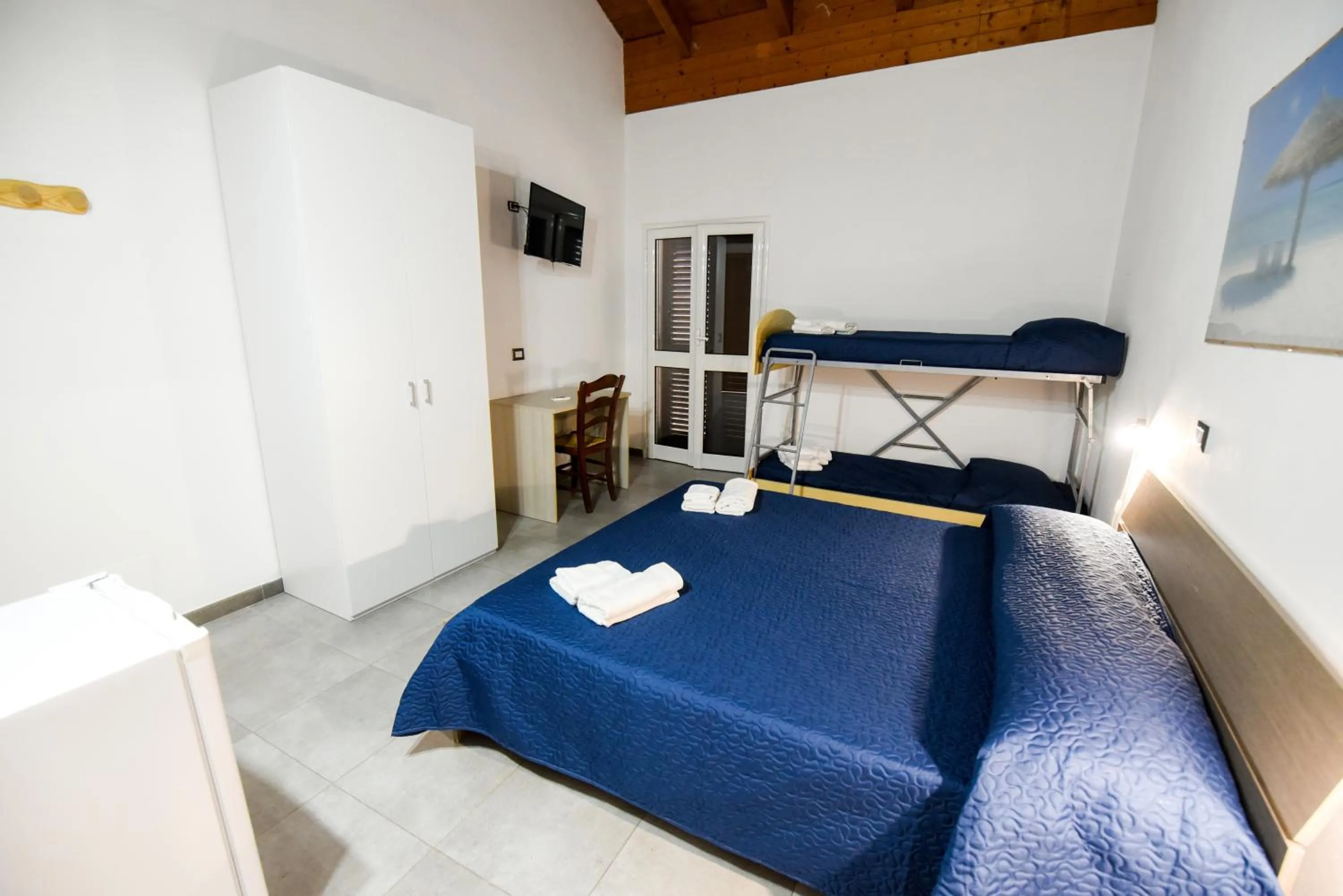 Bed in Giardini Sausari Residence