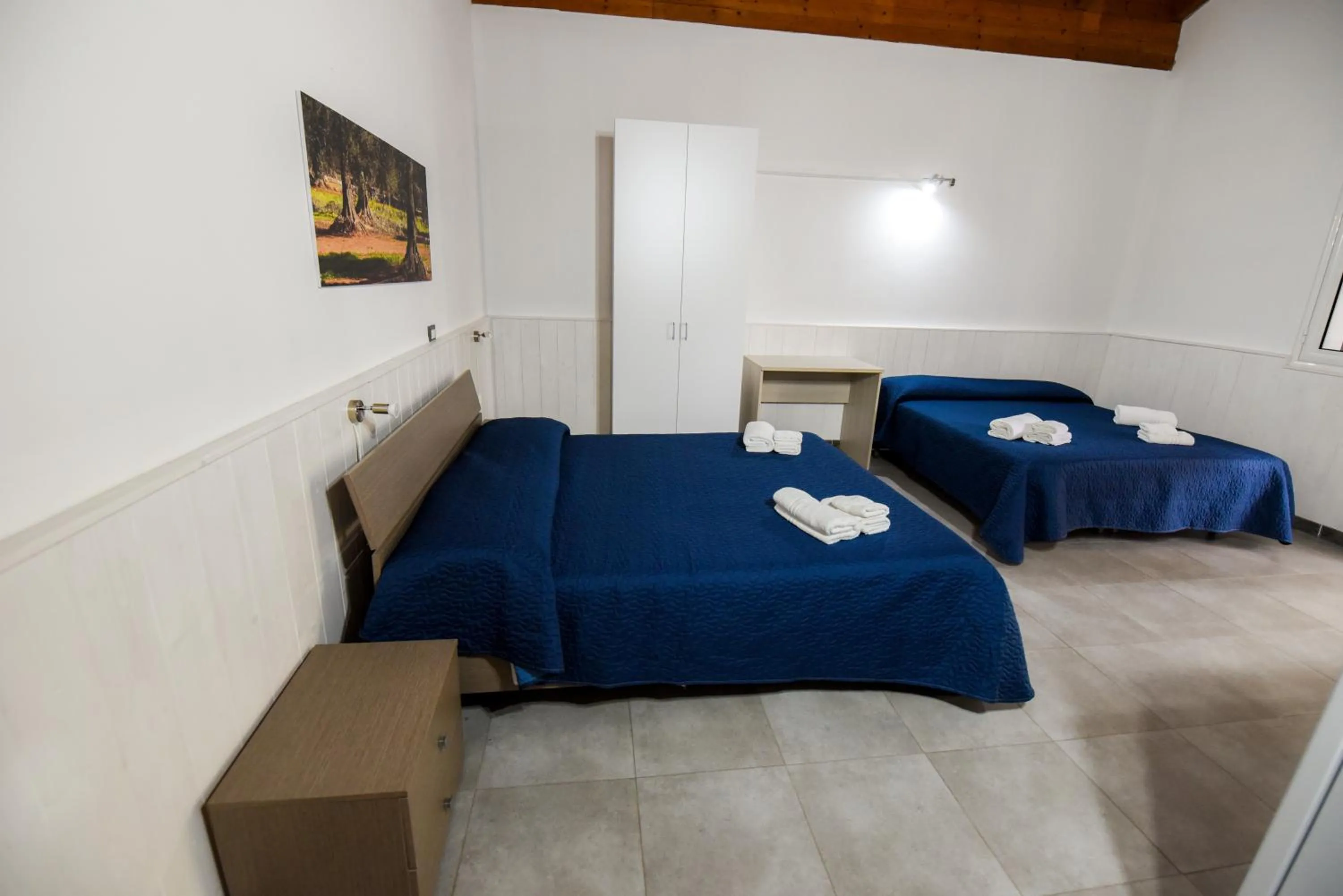 Bed in Giardini Sausari Residence