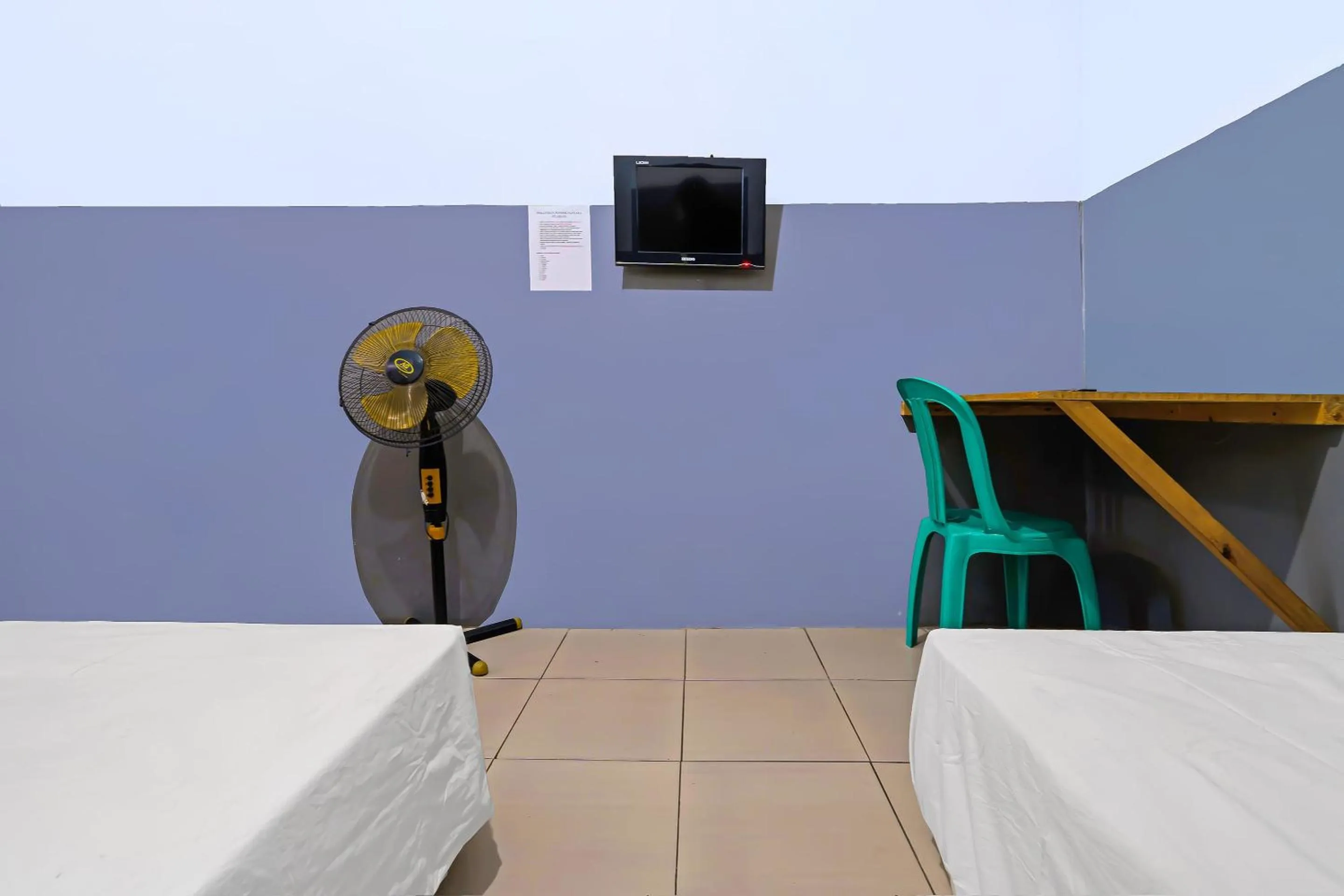 Bedroom in Hotel O Santana Residence Syariah