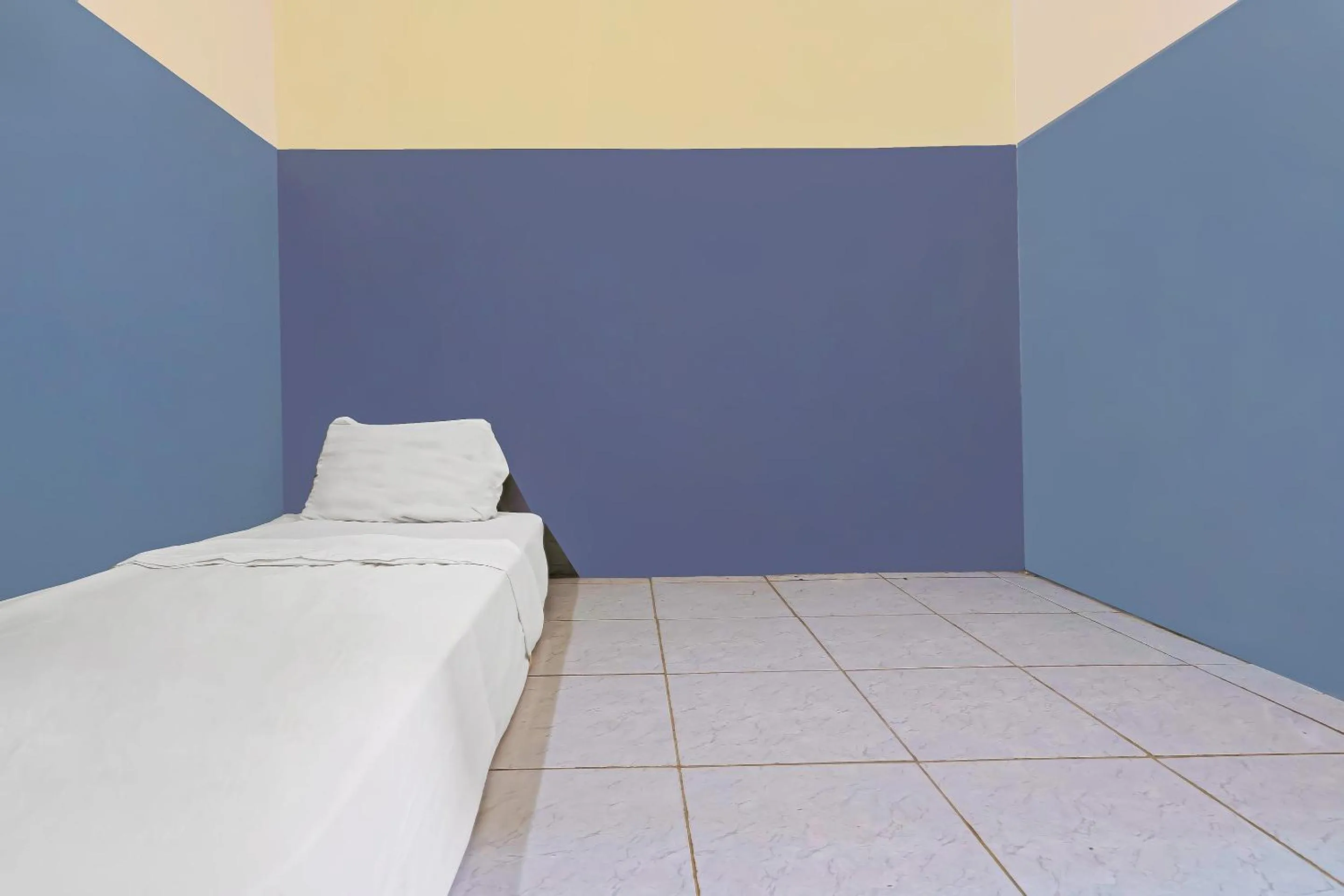 Bedroom in Hotel O Santana Residence Syariah