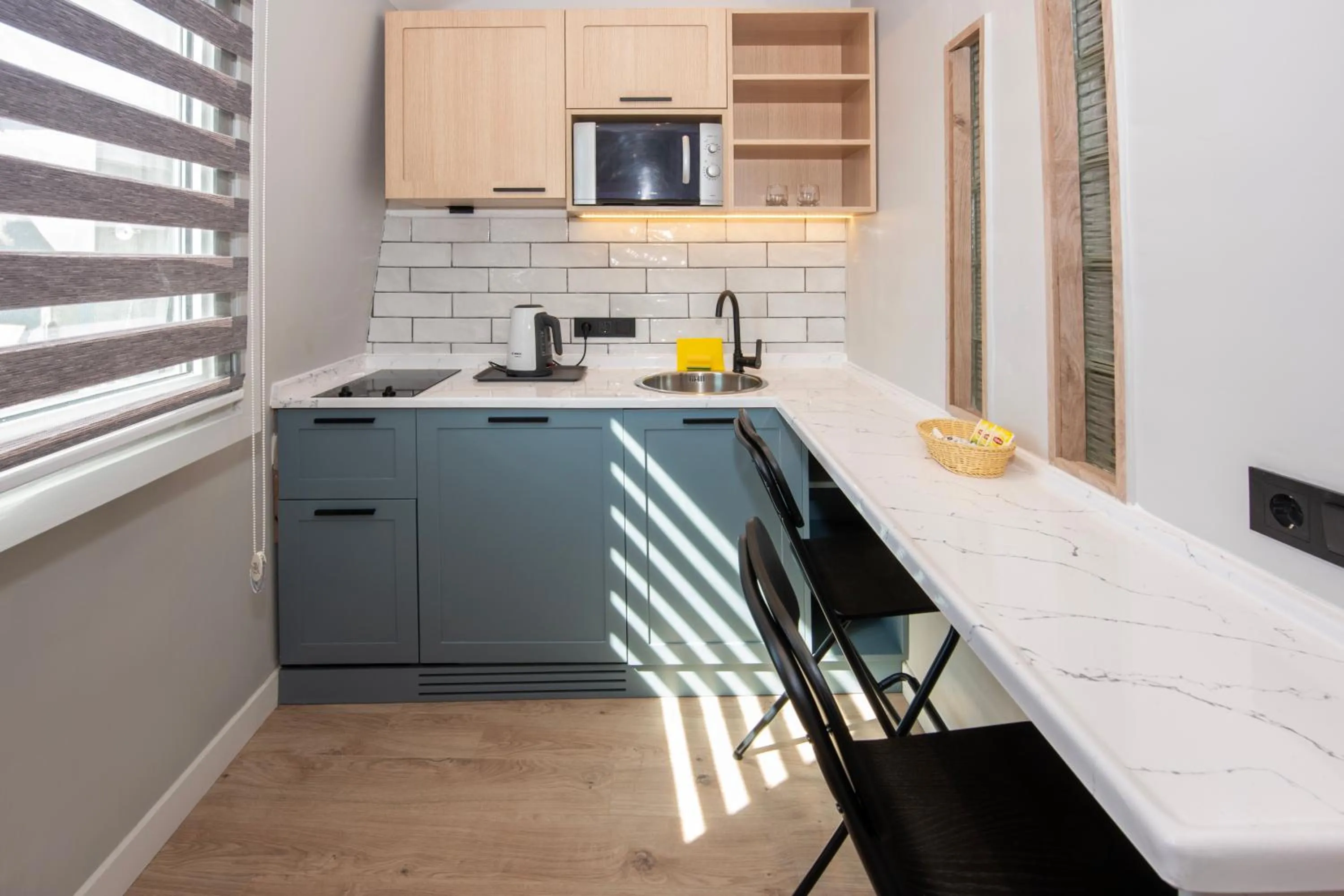 Kitchen or kitchenette in BGuest Hotel & Residence