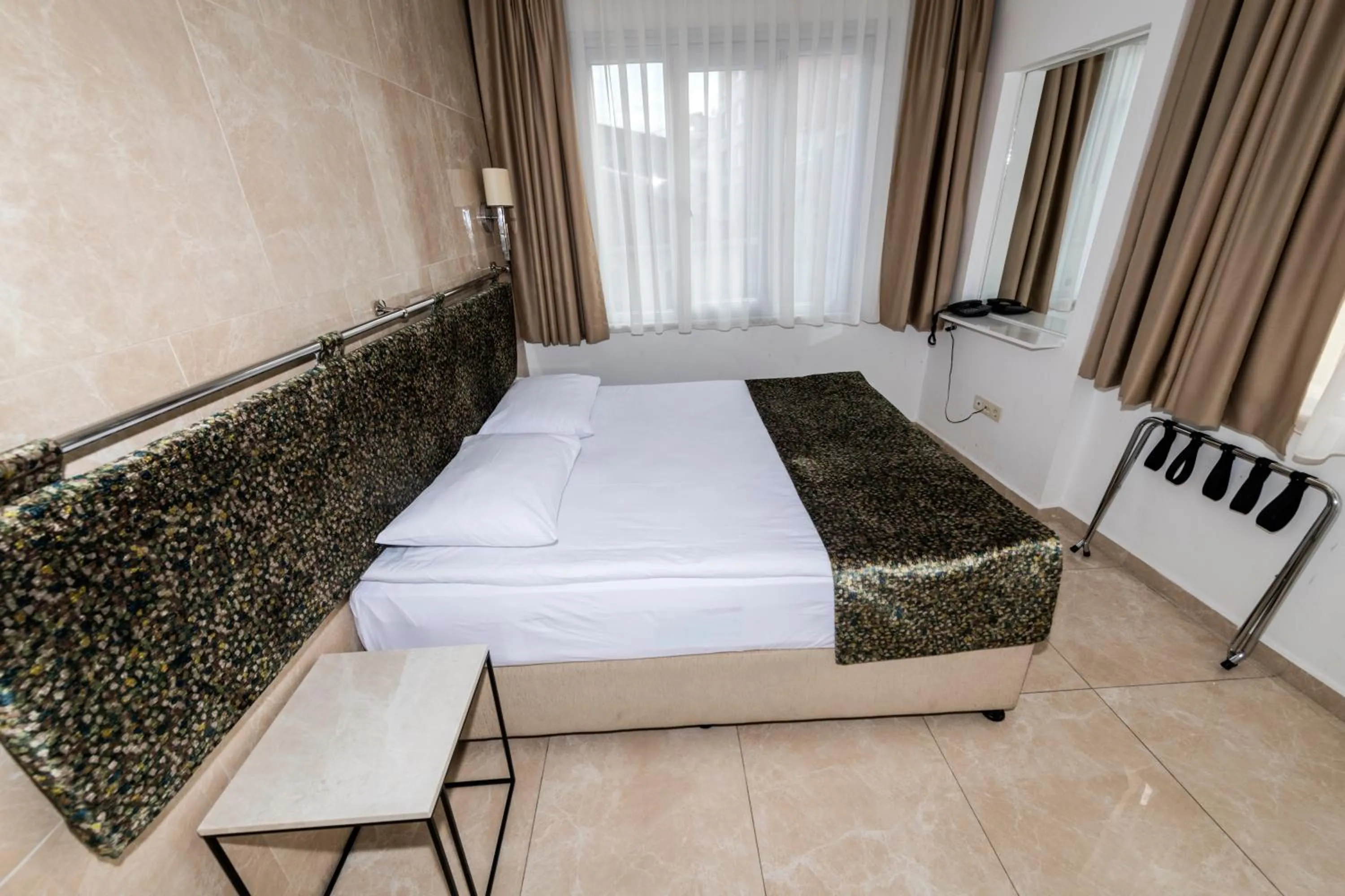 Bed in BGuest Hotel & Residence