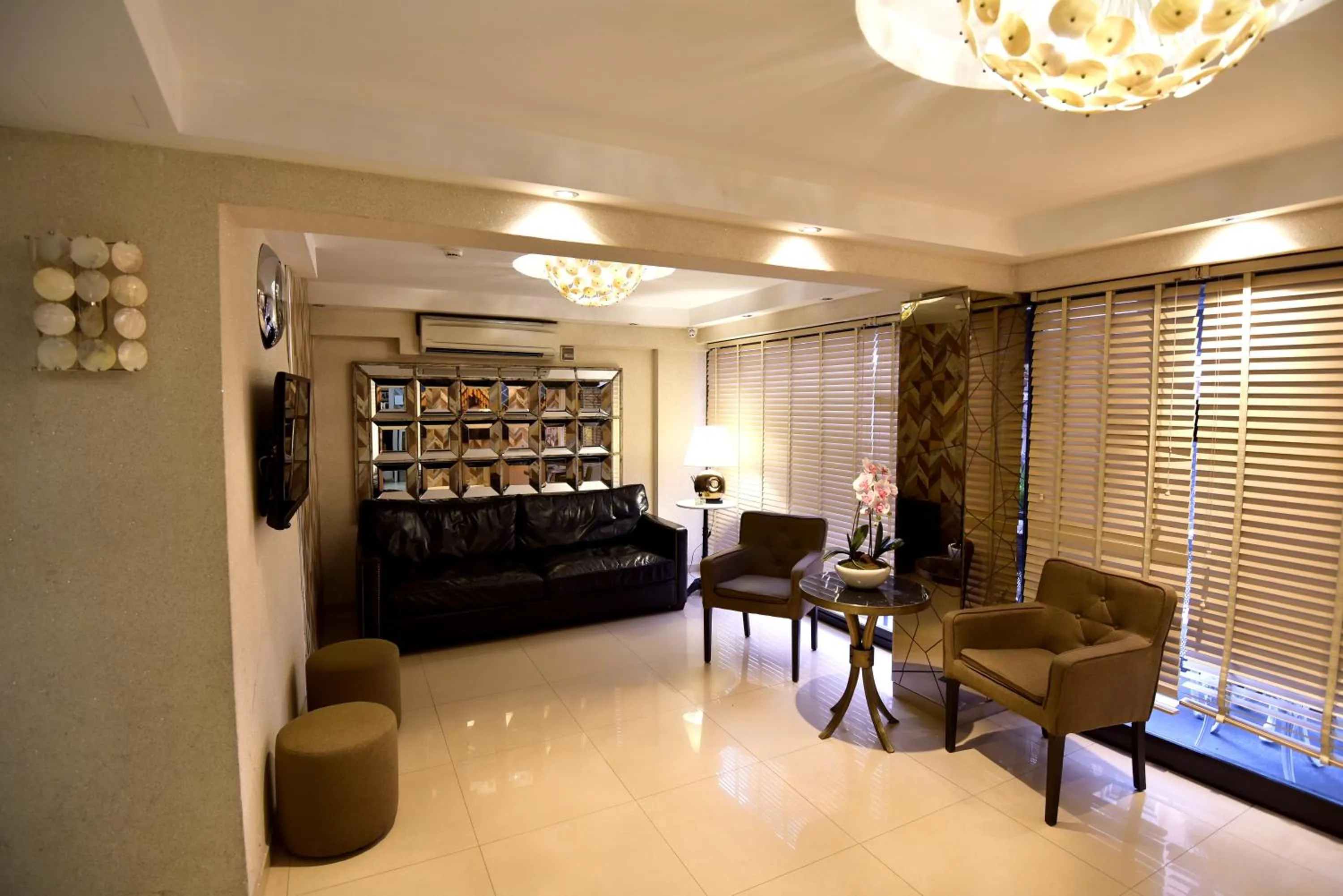 Lobby or reception in BGuest Hotel & Residence