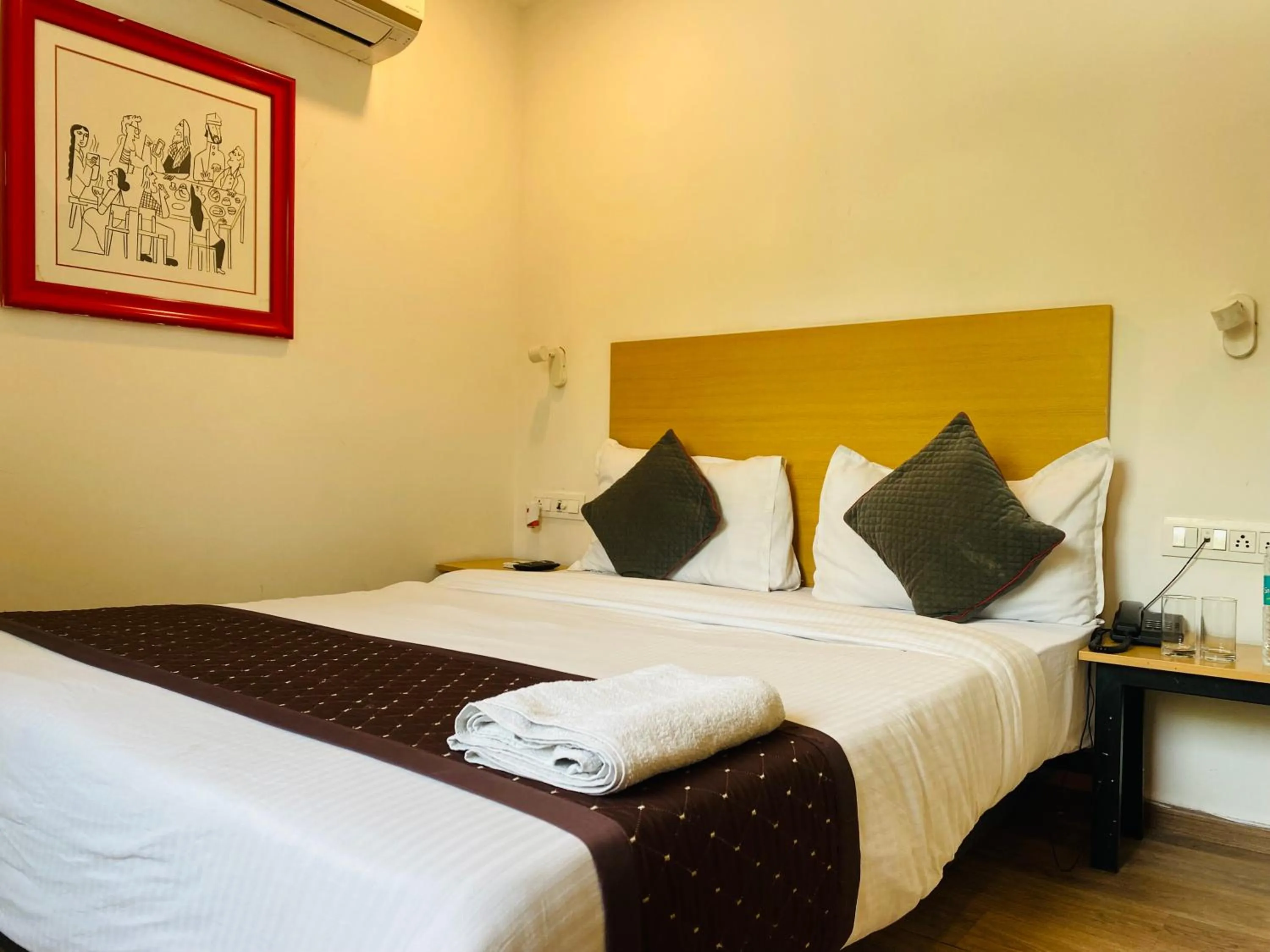 Bed in Qotel Comfort IP Residency East Delhi Preet Vihar