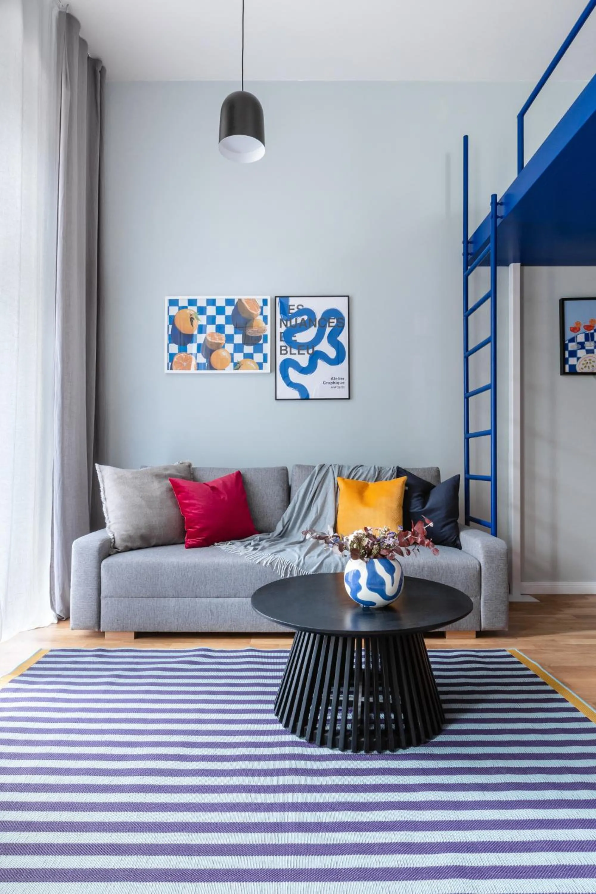 Living room in TurnKey I Charles Square Apartments