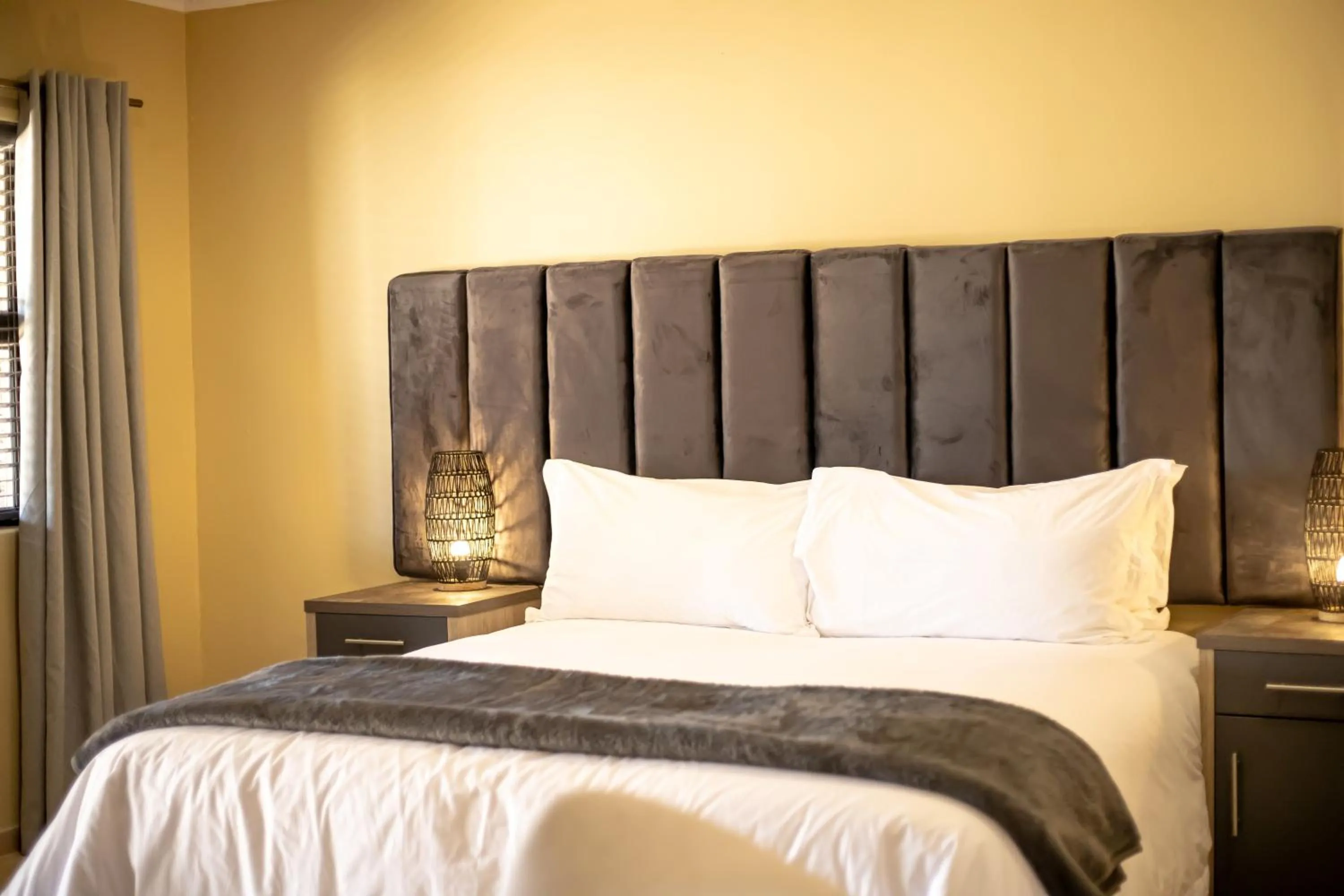 Bed in Shekinah Lion & Game Lodge