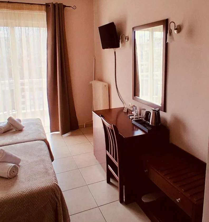 Bed in Hotel Strimoniko