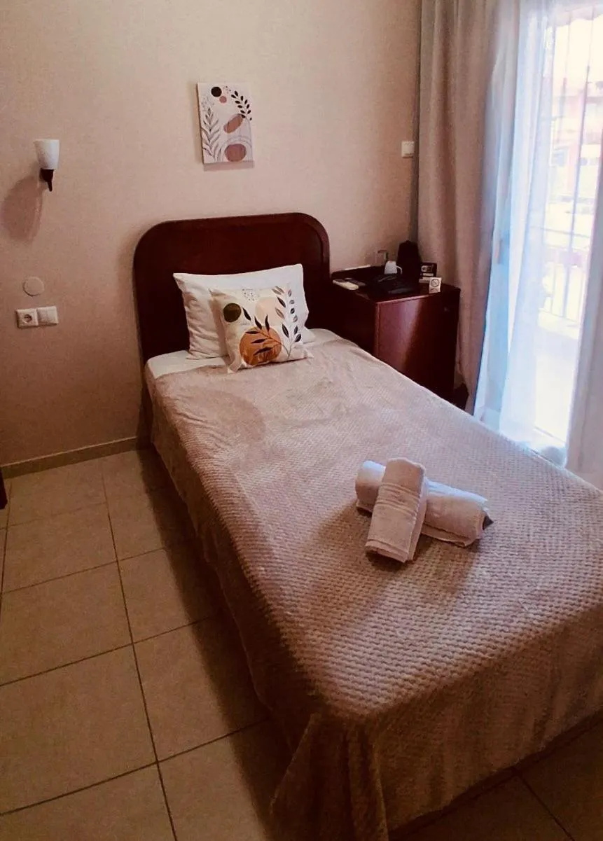 Bed in Hotel Strimoniko