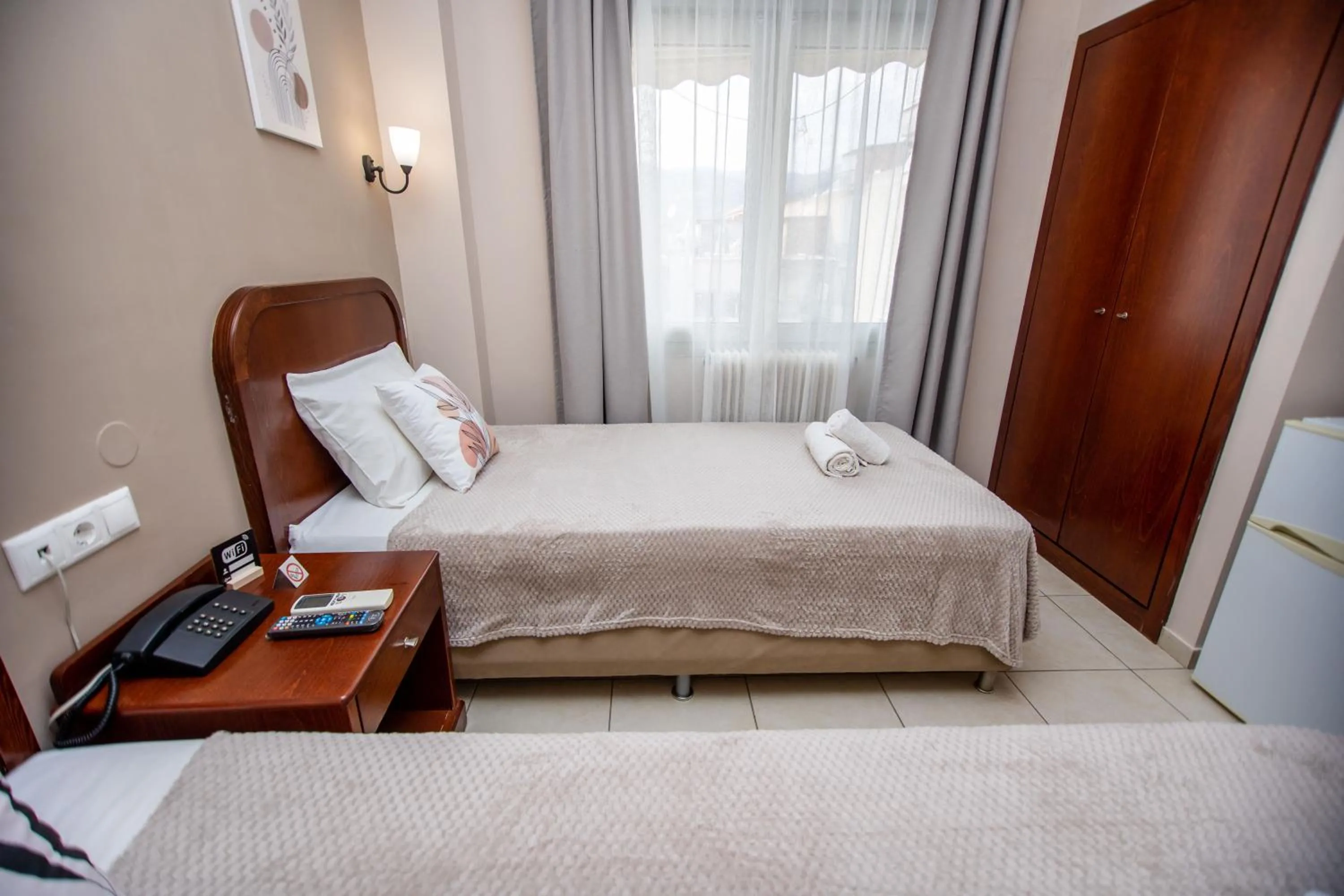 Bed in Hotel Strimoniko