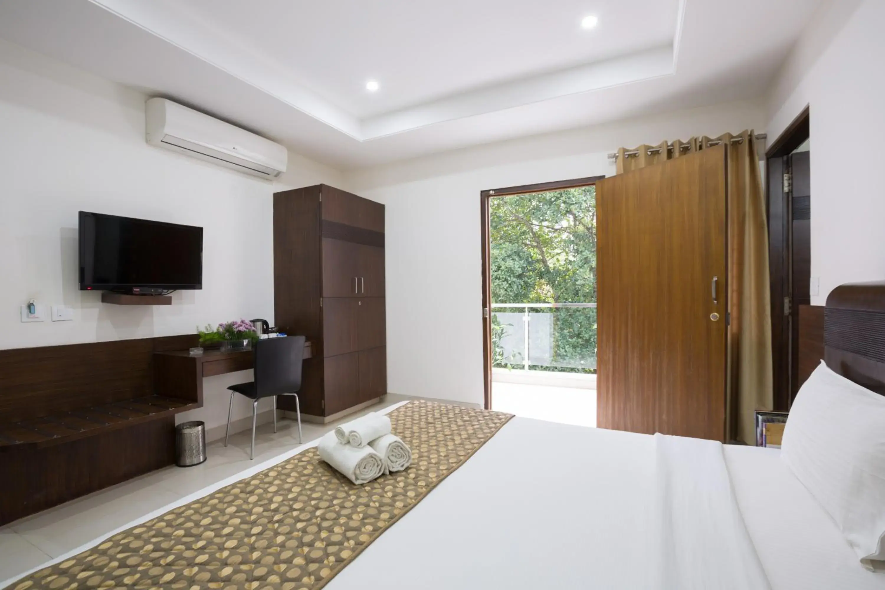 King Room with Balcony - single occupancy in Sanctum Suites BEL Road Bangalore King Room with Balcony - single occupancy in Sanctum Suites BEL Road Bangalore