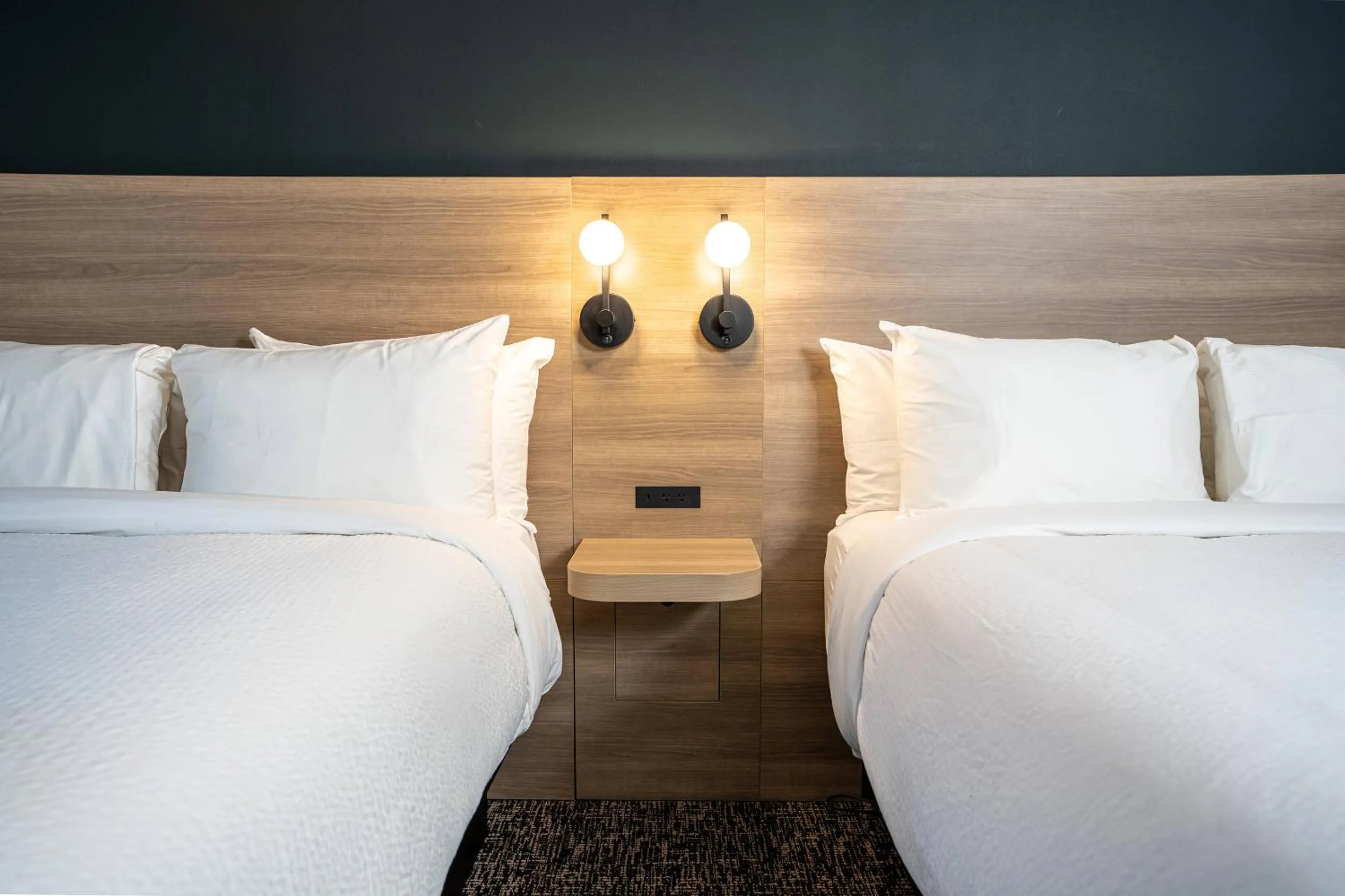 Bed in Northwinds Hotel Revelstoke