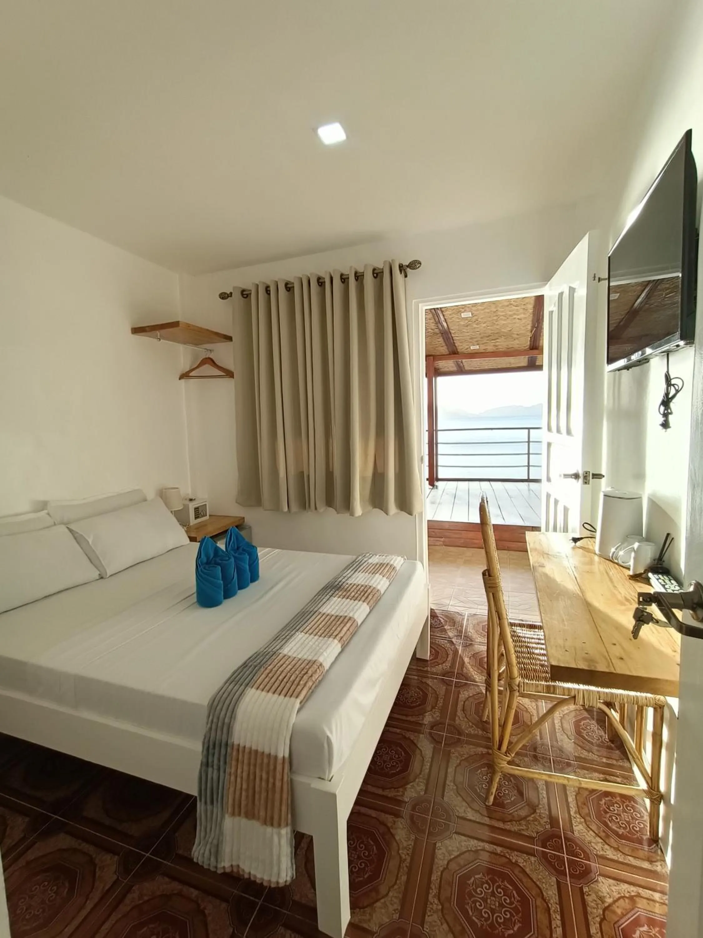 Bed in La Sirenne Inn