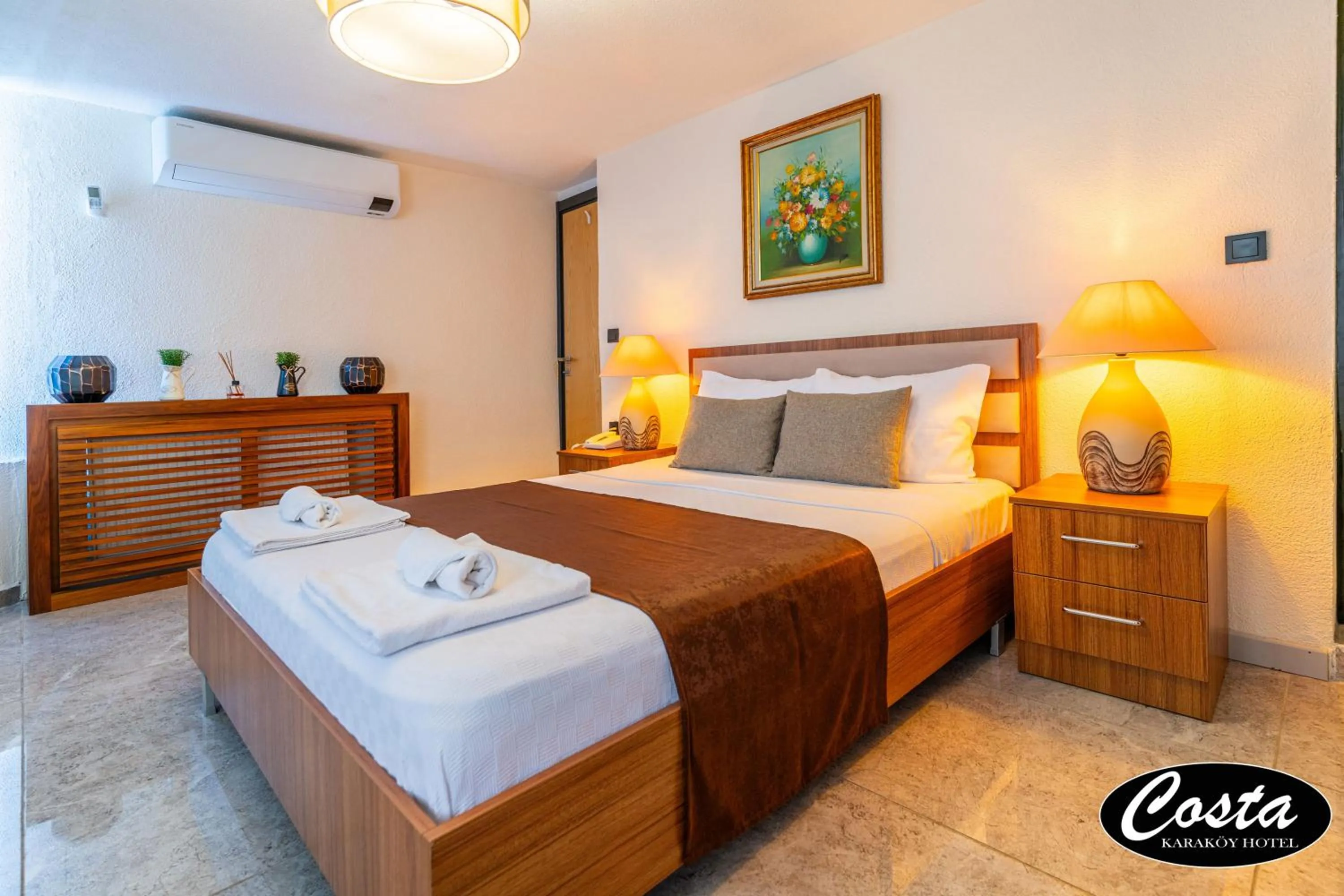 Bed in Costa Karakoy Hotel