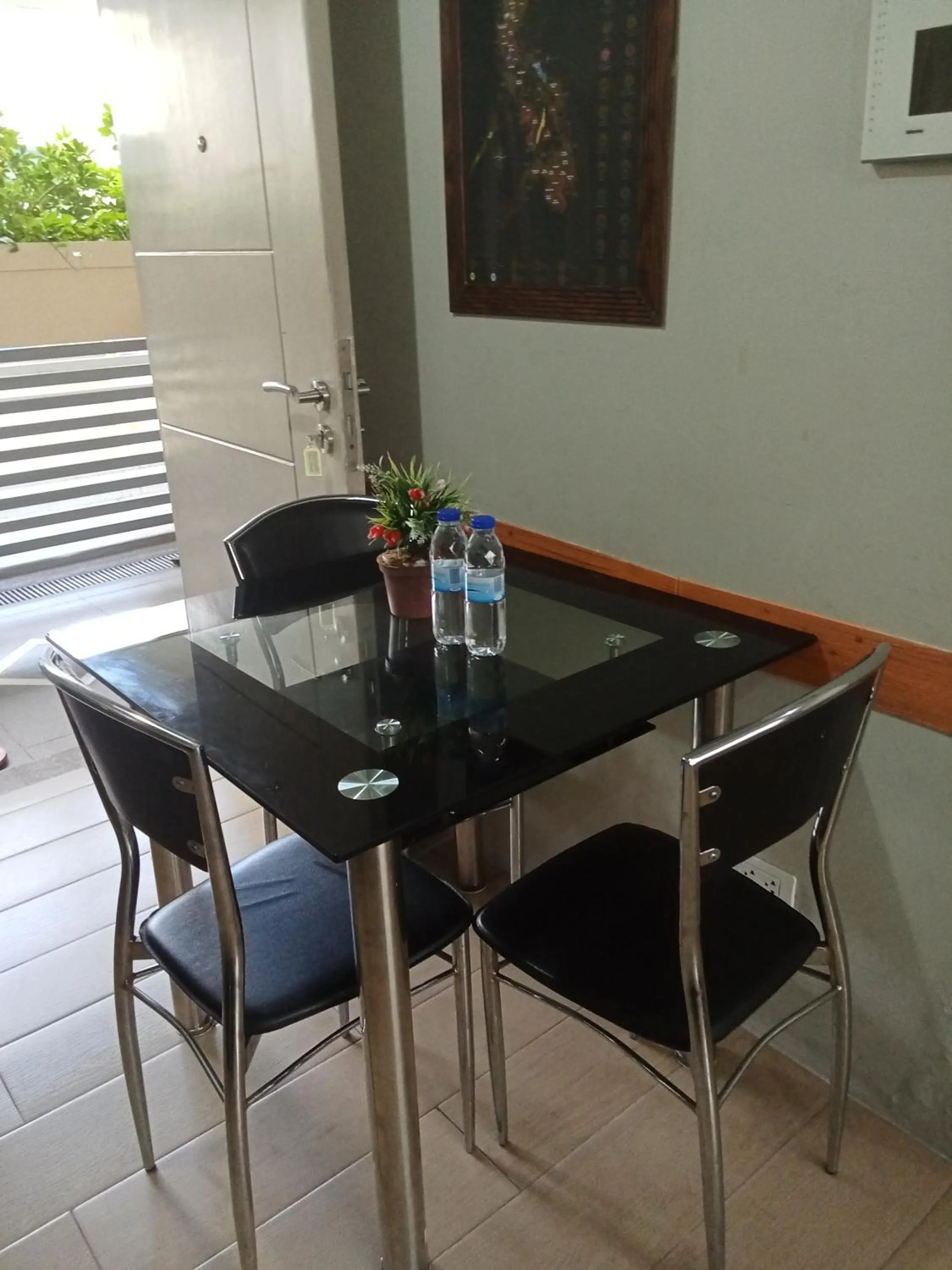 Dining area in Henry's Newport Deluxe Condotel