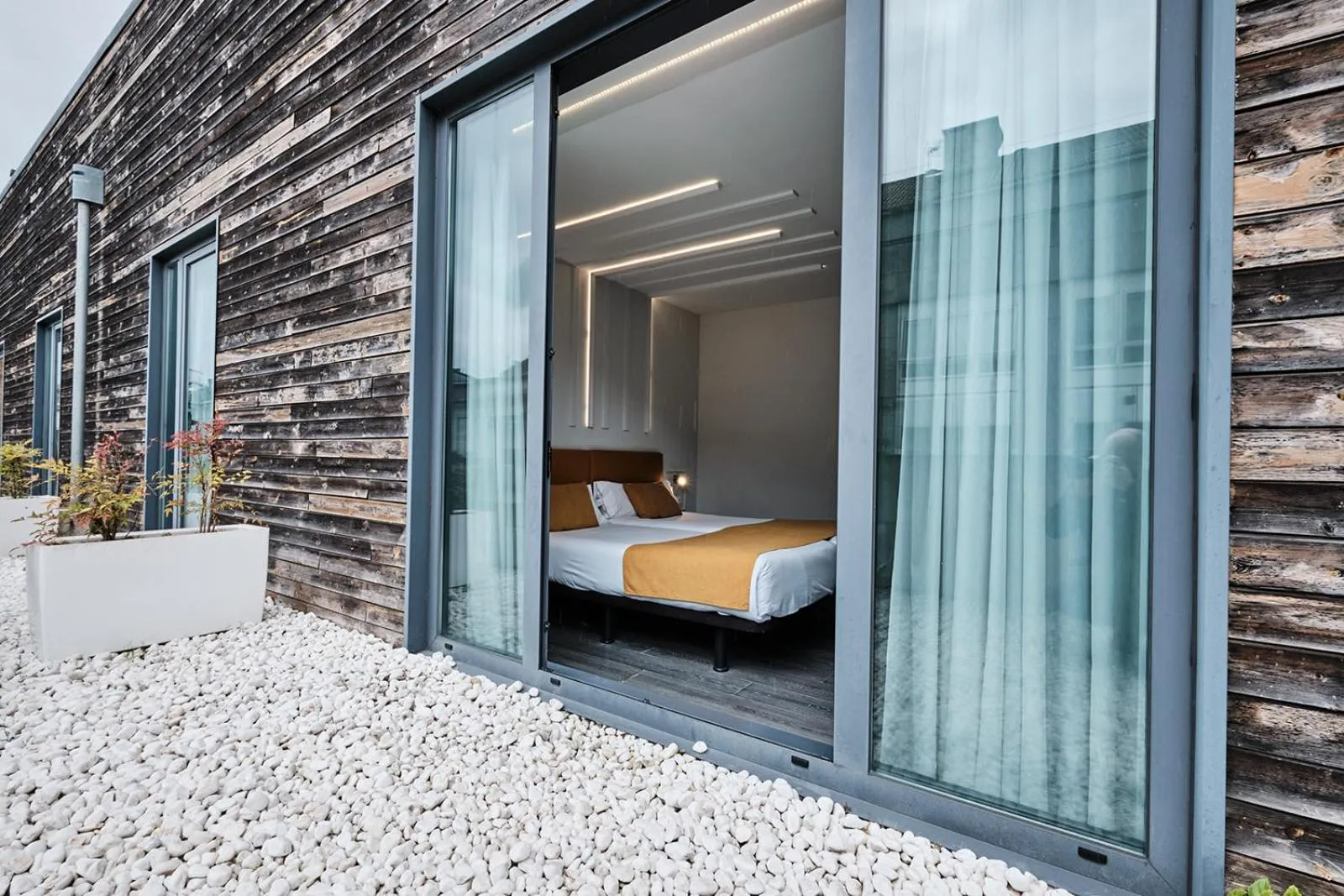 Photo of the whole room, Bed in Hotel Lux Santiago