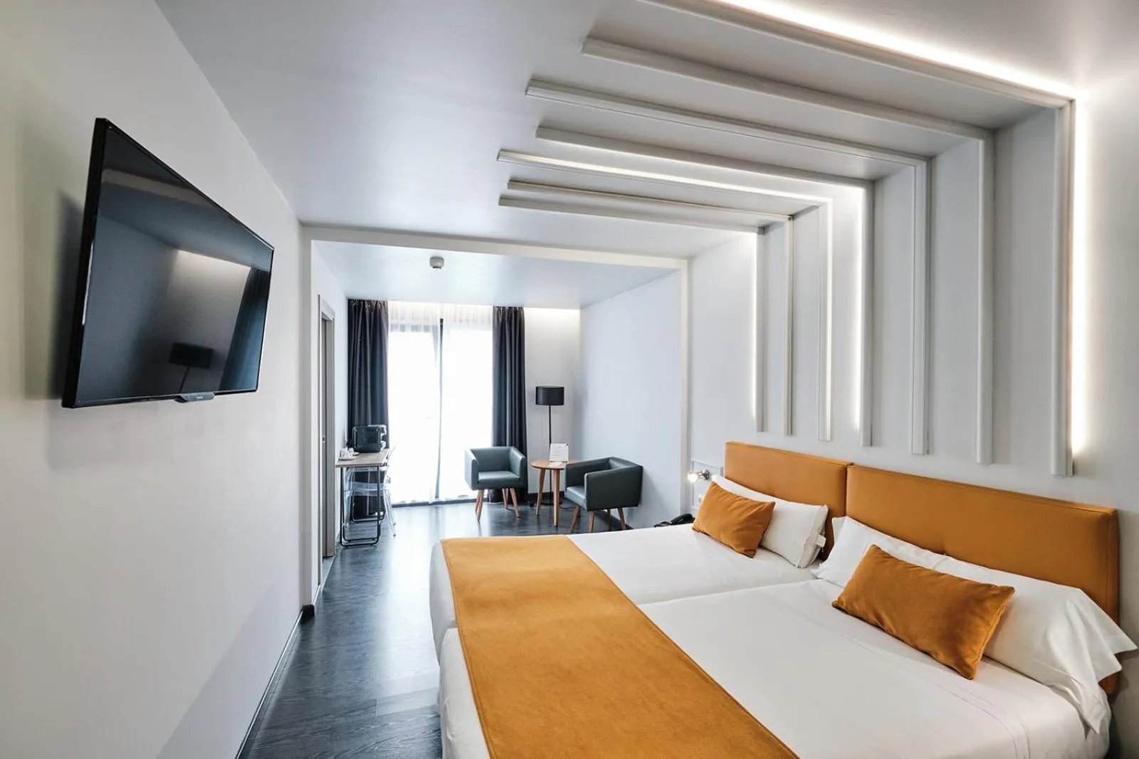 Living room, Bed in Hotel Lux Santiago