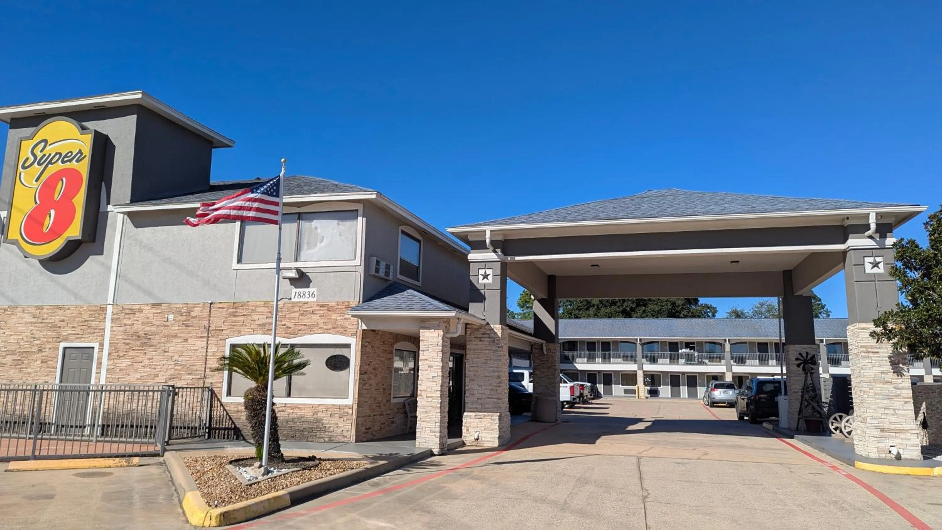 Property building in Super 8 by Wyndham Willowbrook Houston