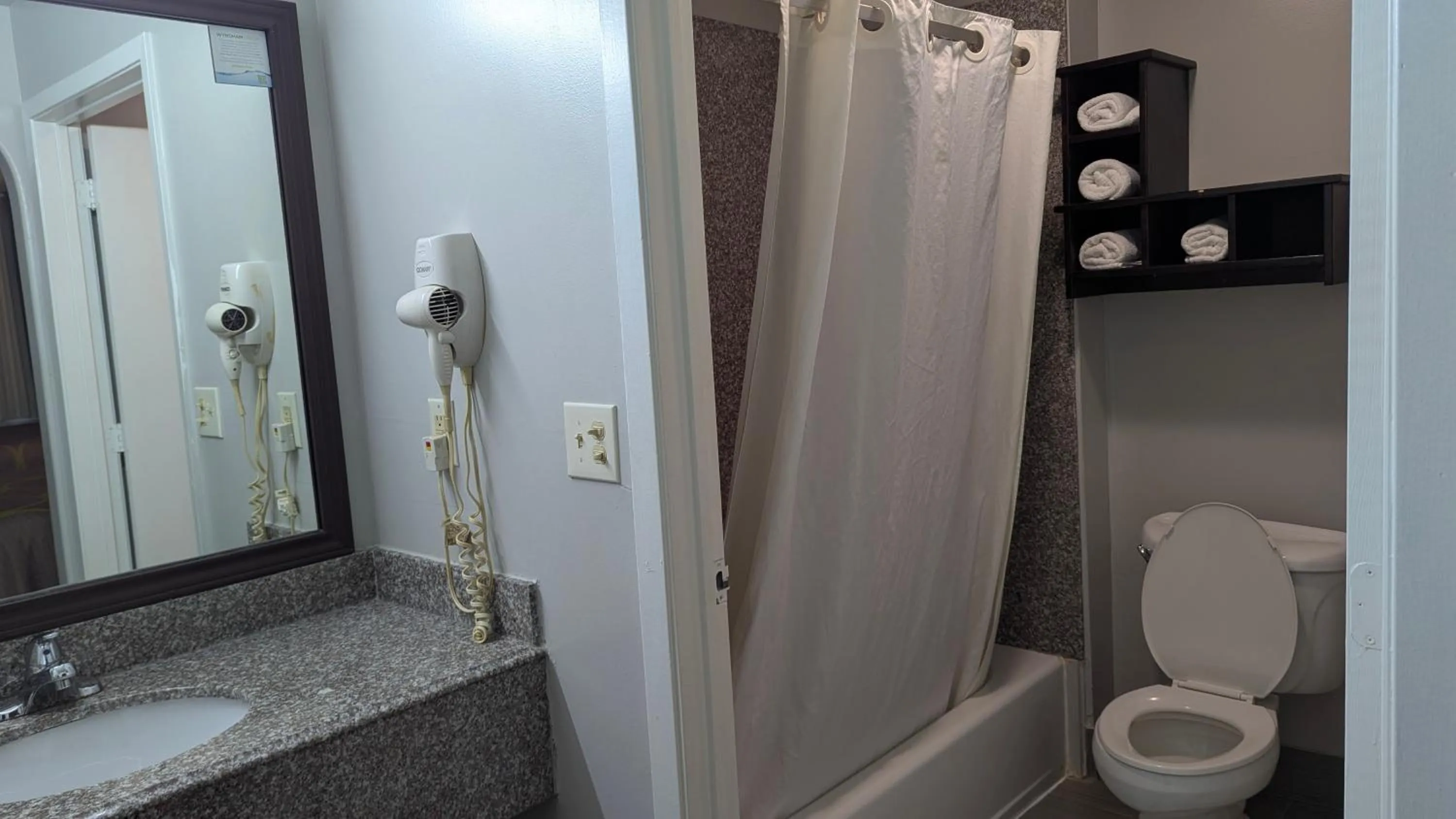 Bathroom in Super 8 by Wyndham Willowbrook Houston