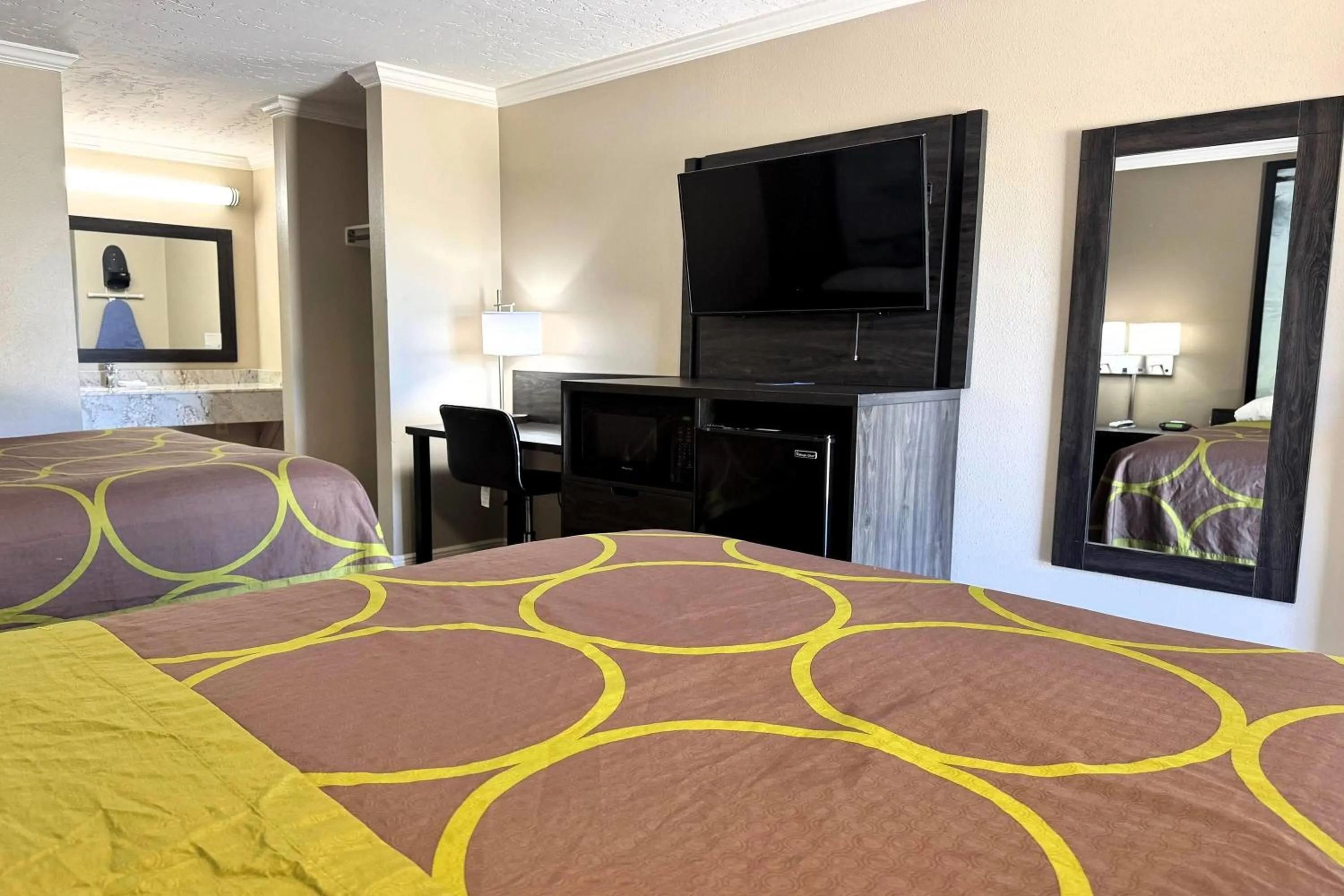 Photo of the whole room, Bed in Super 8 by Wyndham Picayune