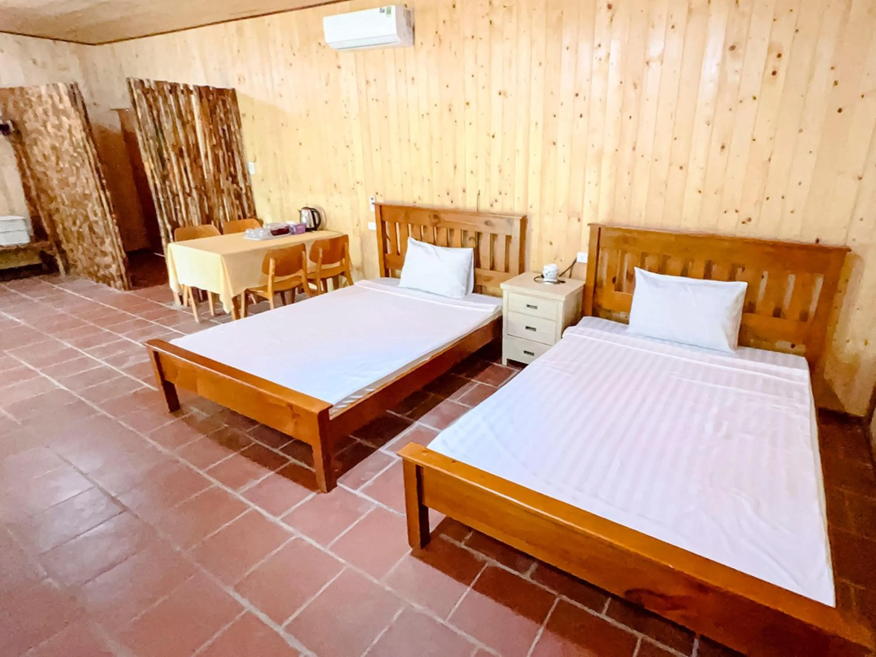 Bed in Me bungalow beach resort