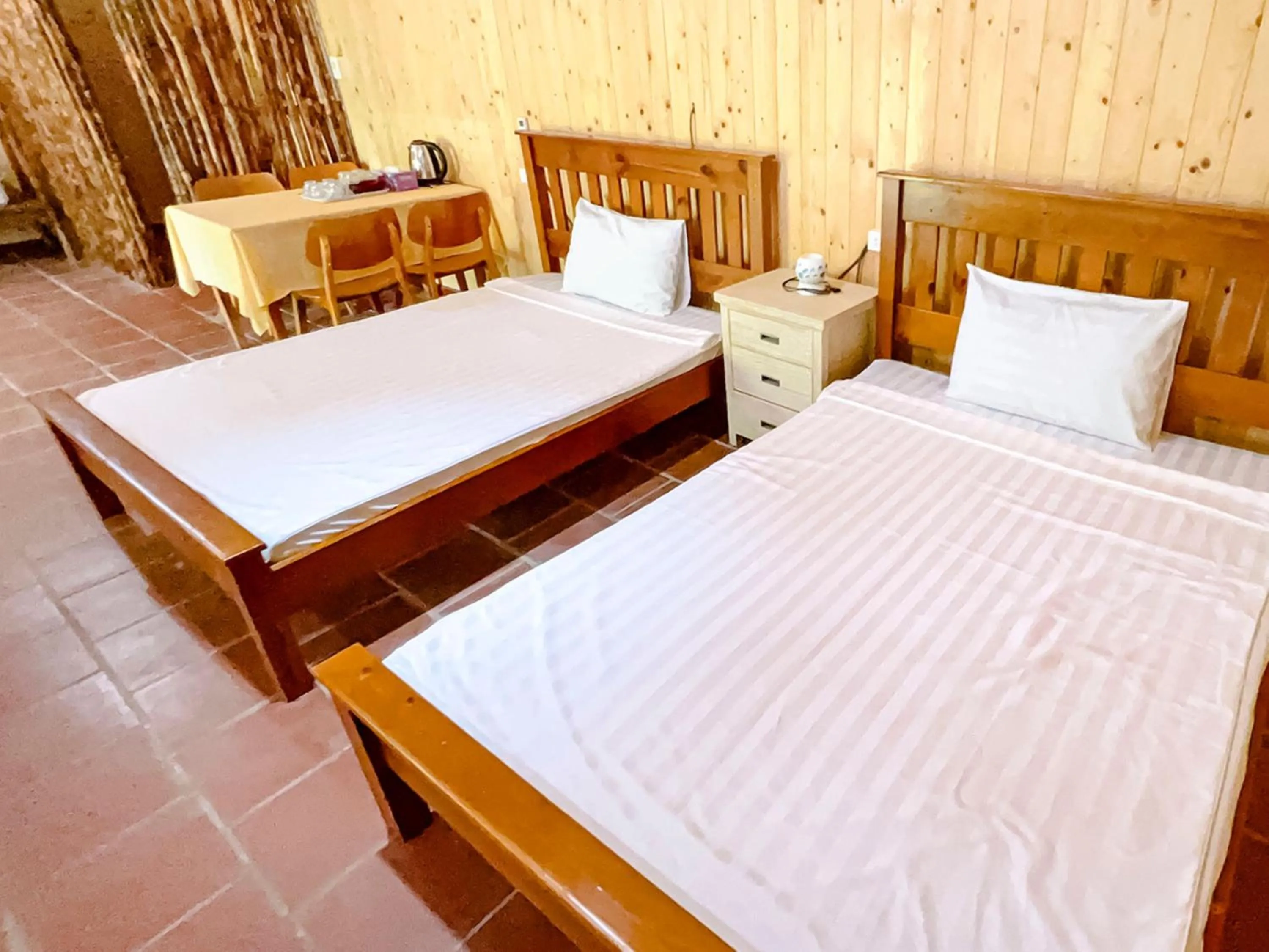Bed in Me bungalow beach resort