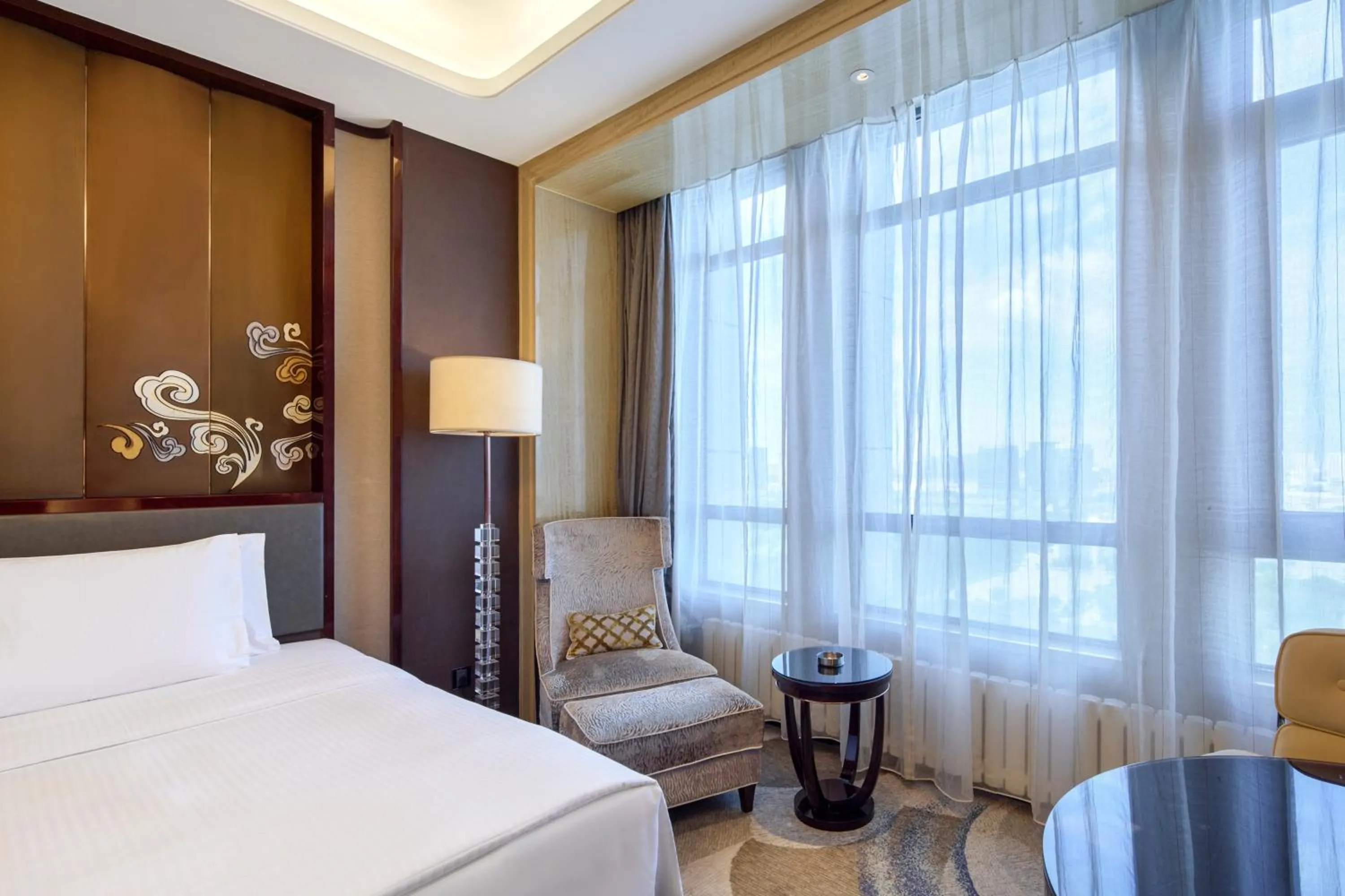 Seating area, Bed in Wanda Realm Yinchuan