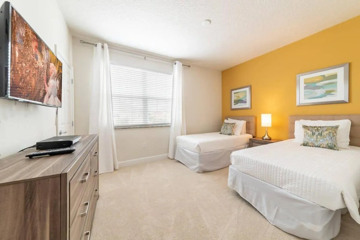 Bed in Ultimate Getaway - Your Best Vacation Home